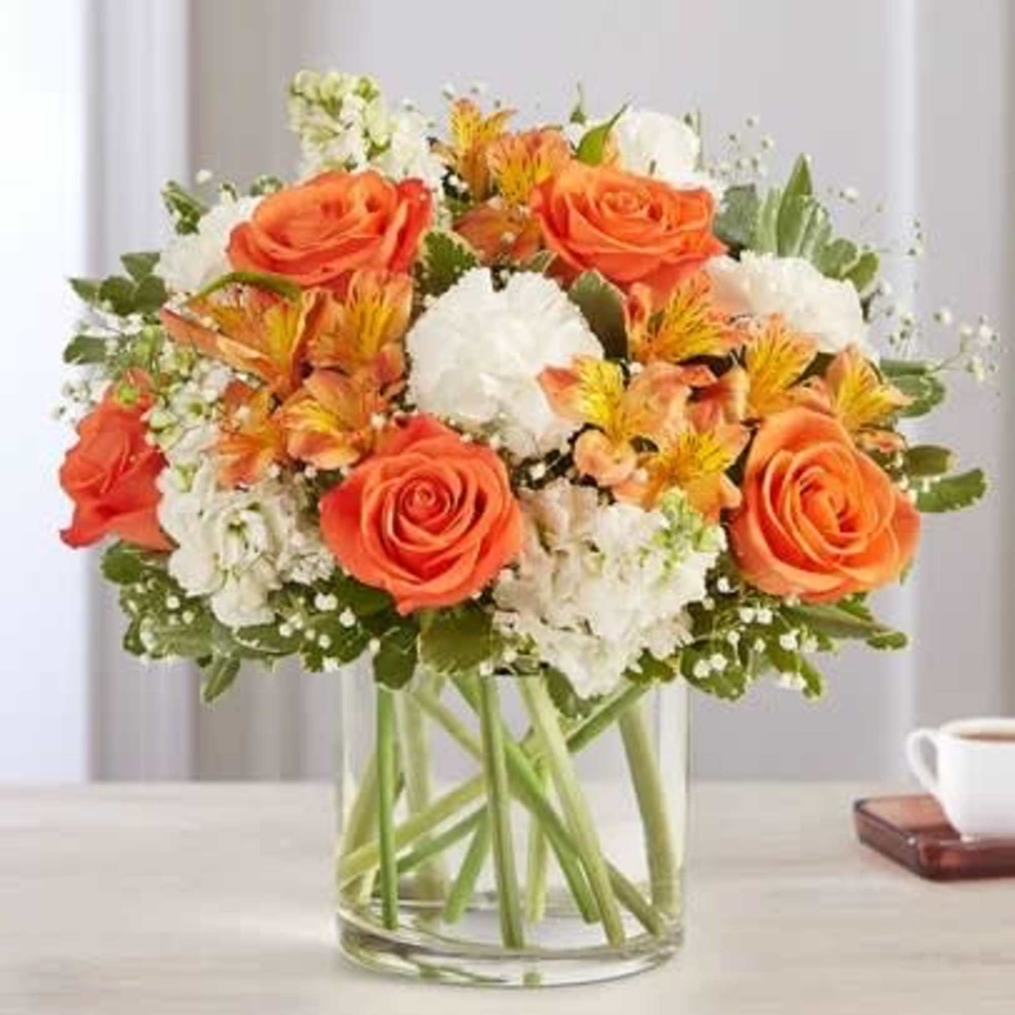 The sweet citrus shades in our charming bouquet bring your sentiments to