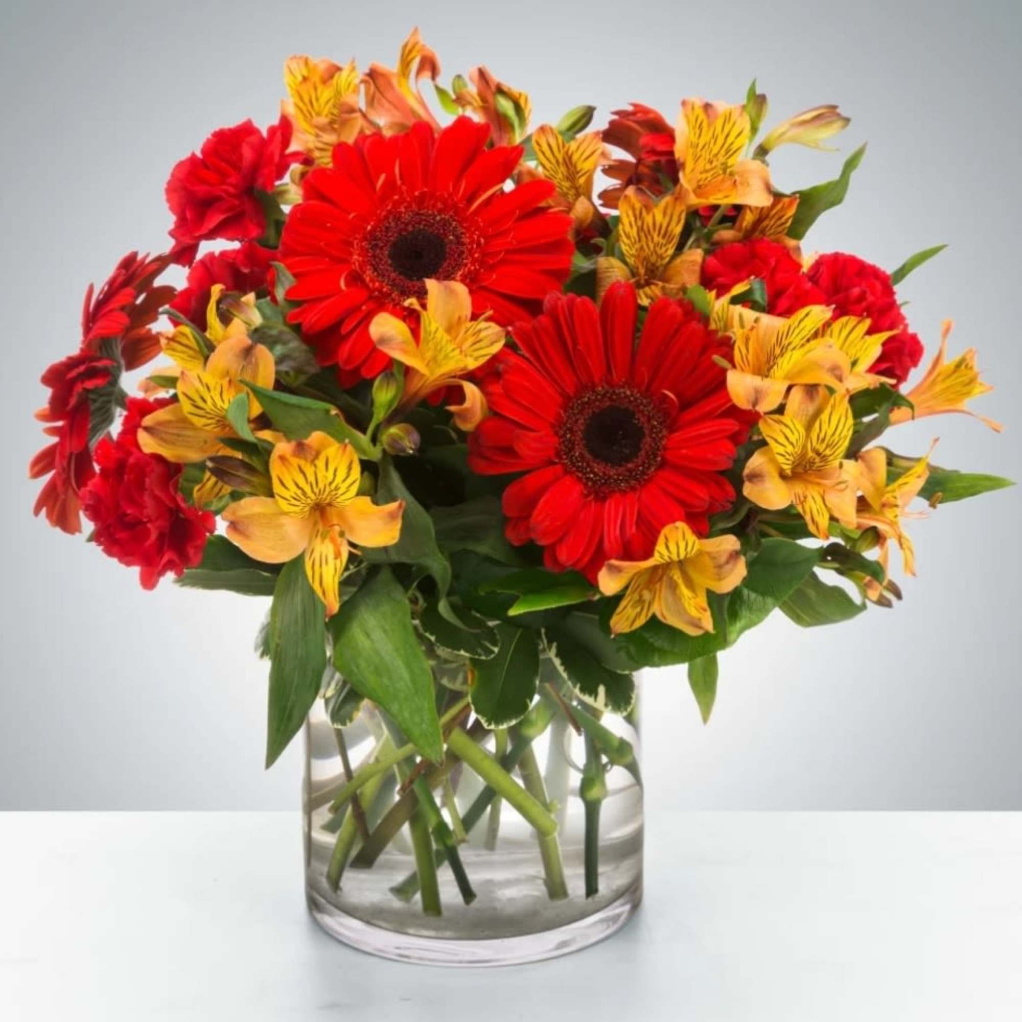 This cinnamon-colored arrangement is a perfect taste of fall. Perfect for any