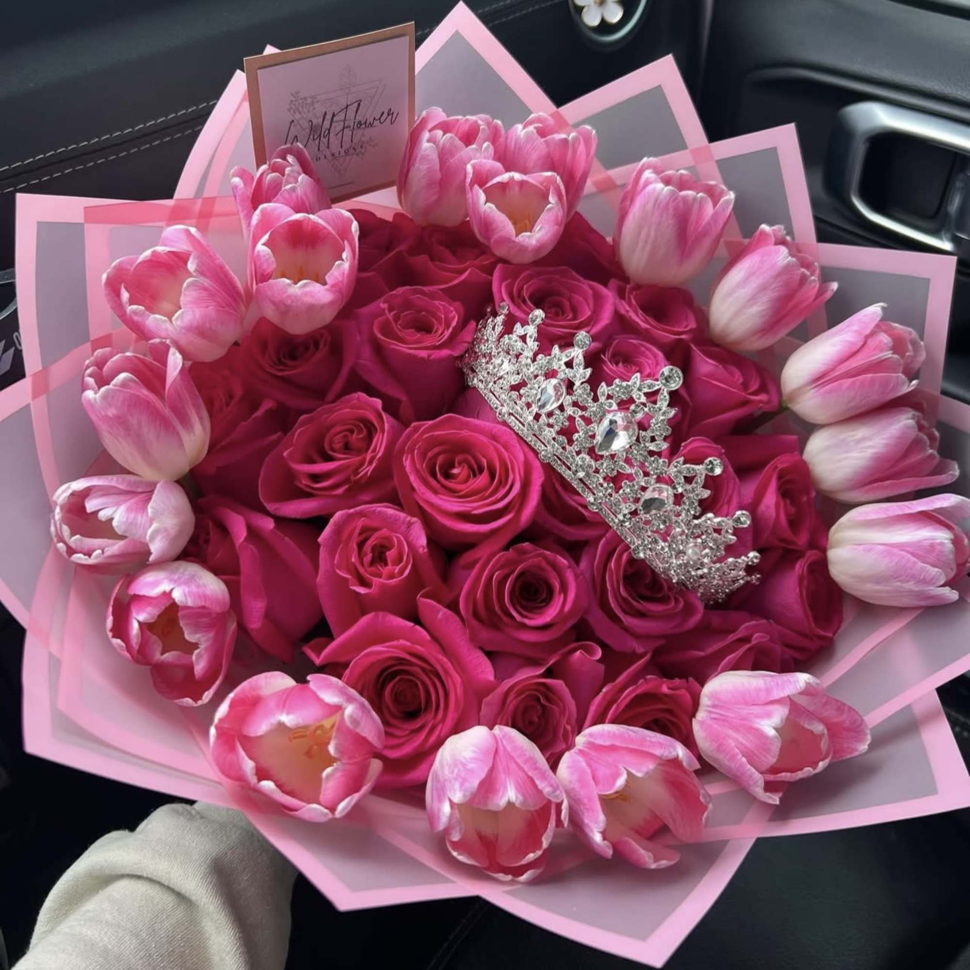 Pink rose bouquet with tulips and a jeweled tiara