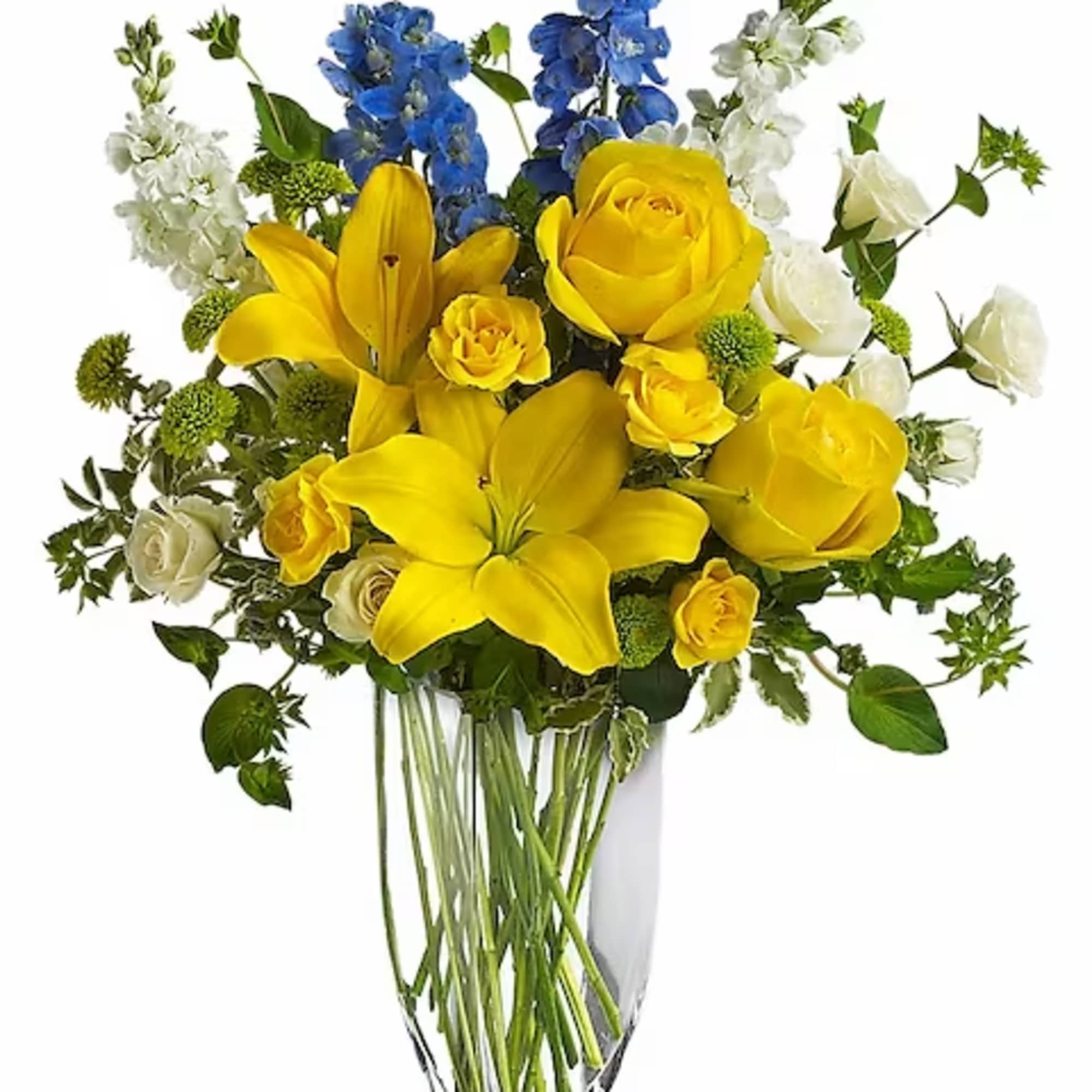 Yellow lilies and roses in a clear glass vase with blue and white flowers
