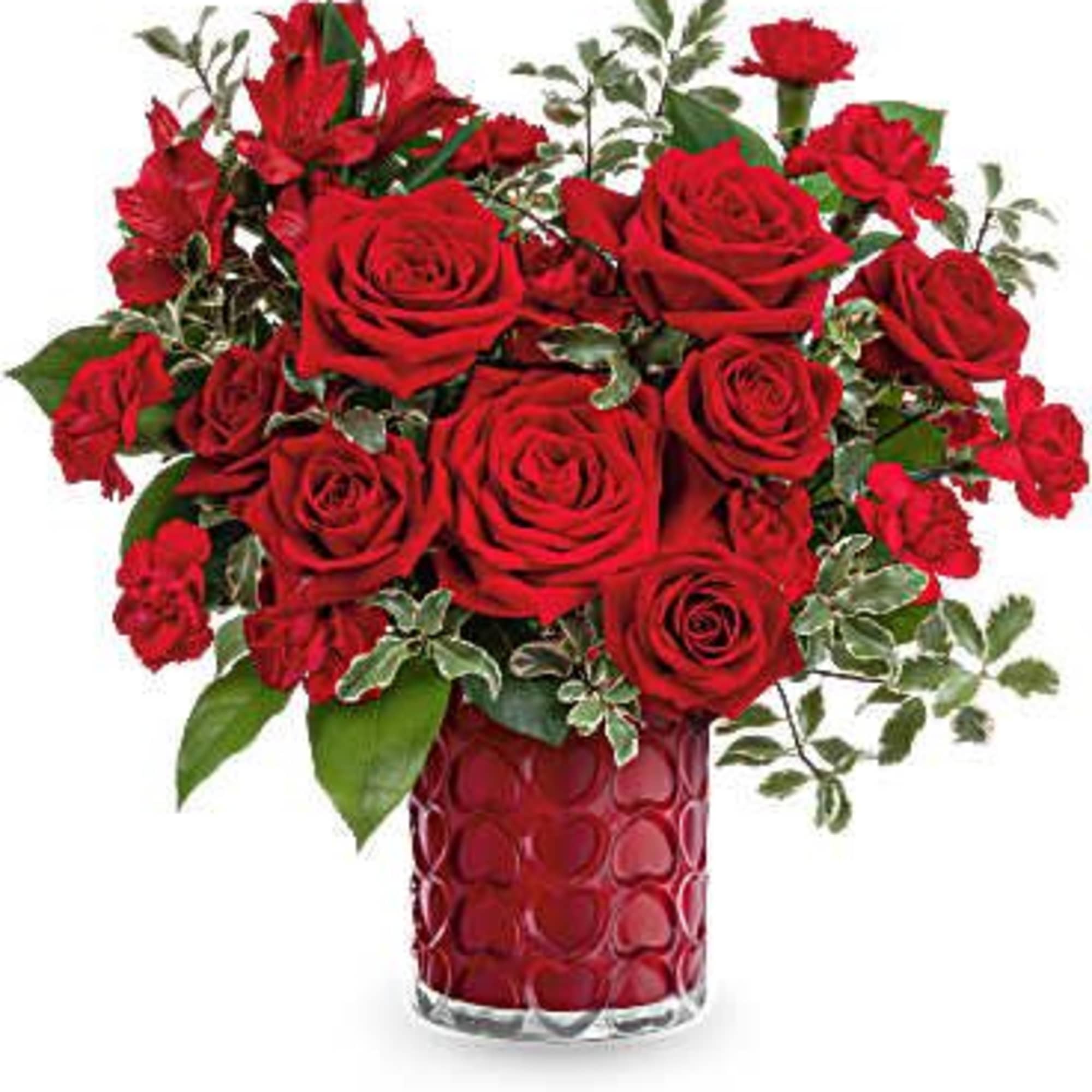 Red roses and carnations in a red glass vase
