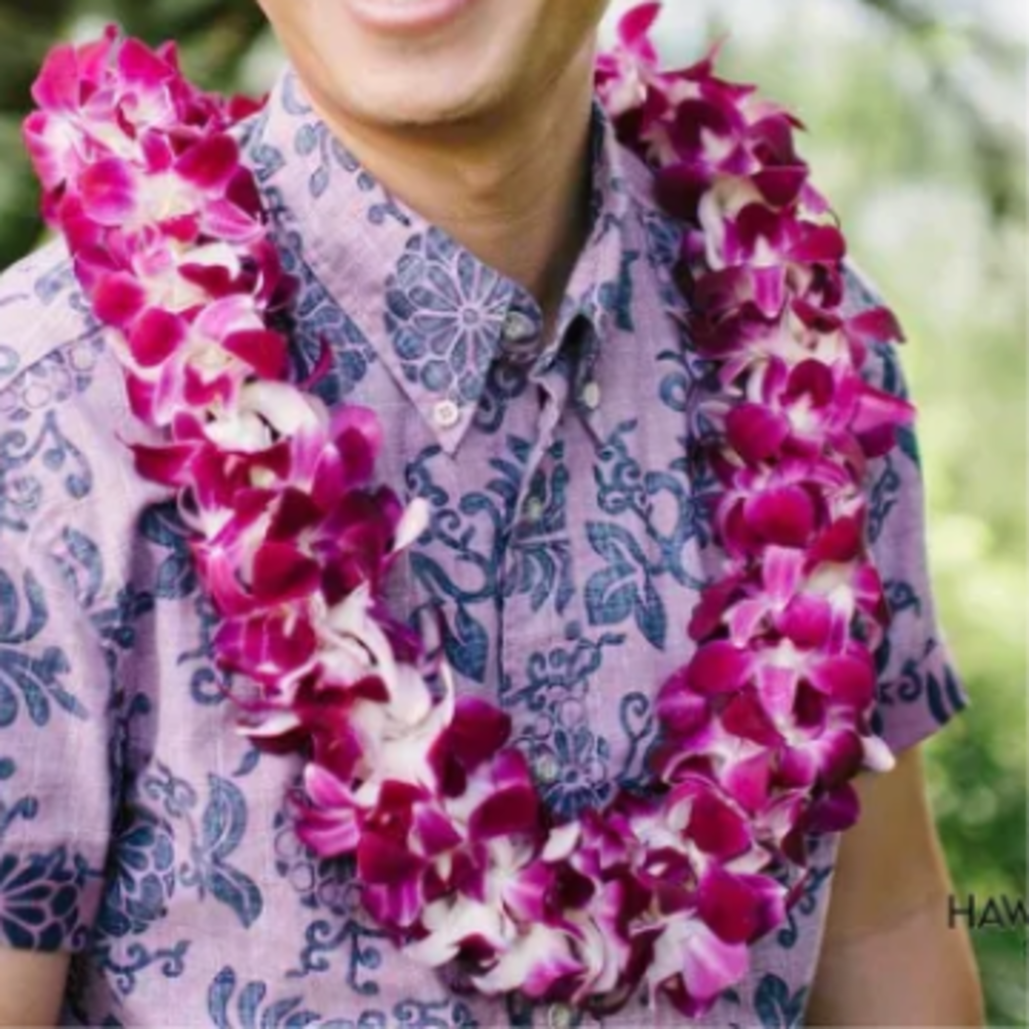Vivid magenta‑purple dendrobium orchids strung into a double lei make an unforgettable, photo 2 of 2