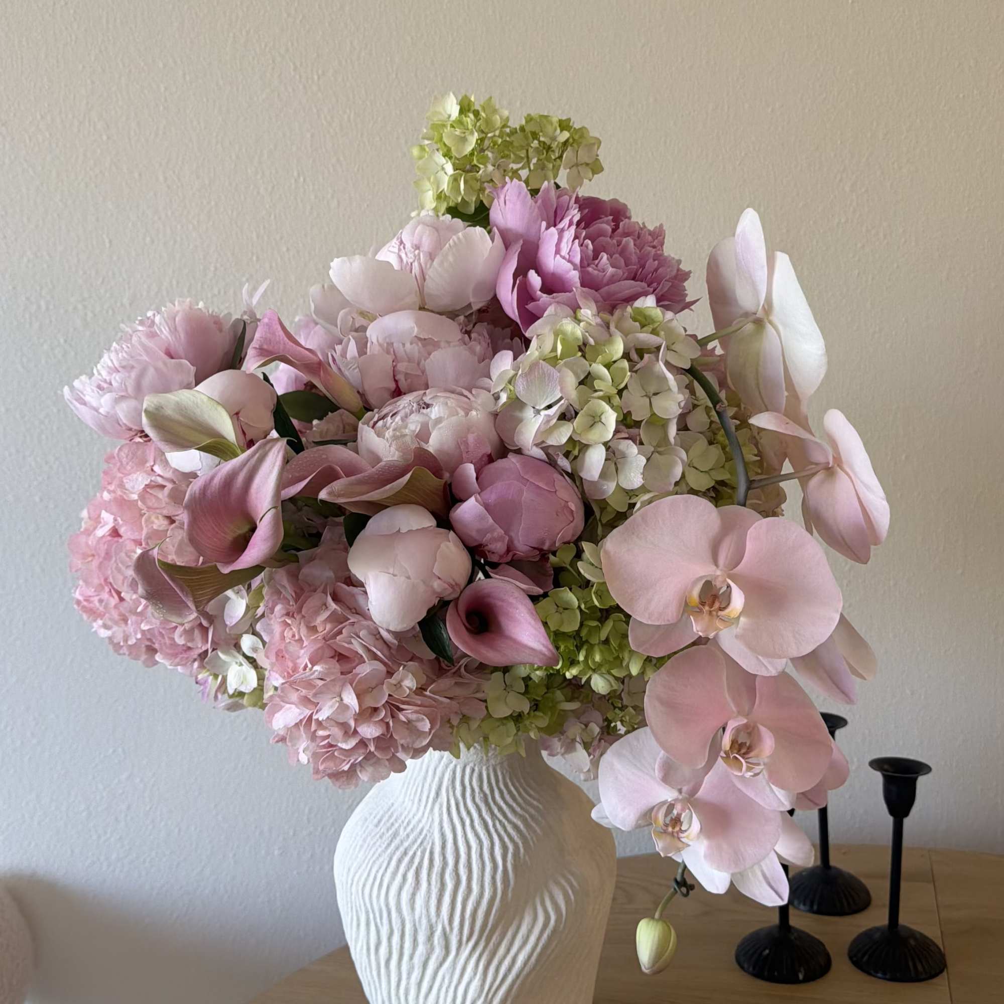 Stunning ceramic vase full of Peonies, Hydrangeas, and other mixed flowers