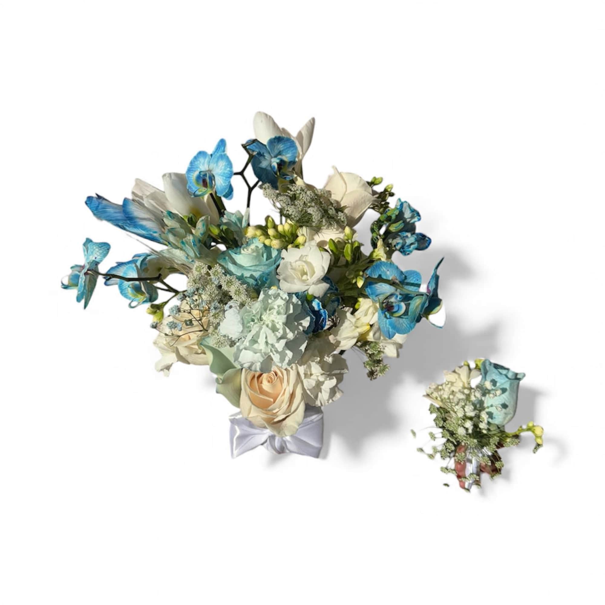 Wedding bouquet with blue orchids and cream roses, plus a matching boutonniere