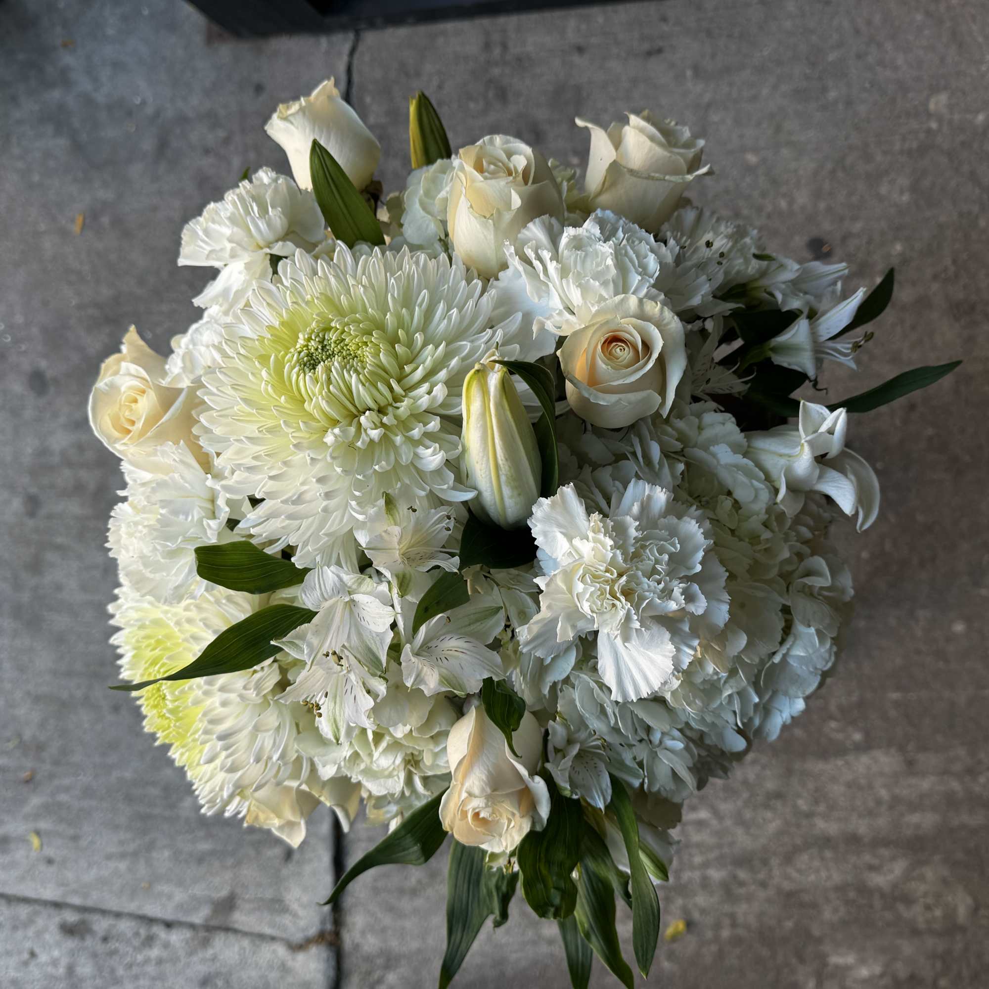 White bouquet with roses, chrysanthemums, and lilies