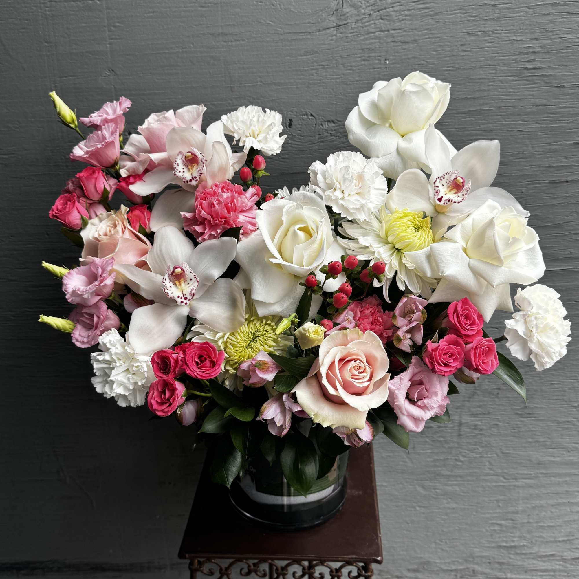 Pink and white mixed bouquet in a glass vase