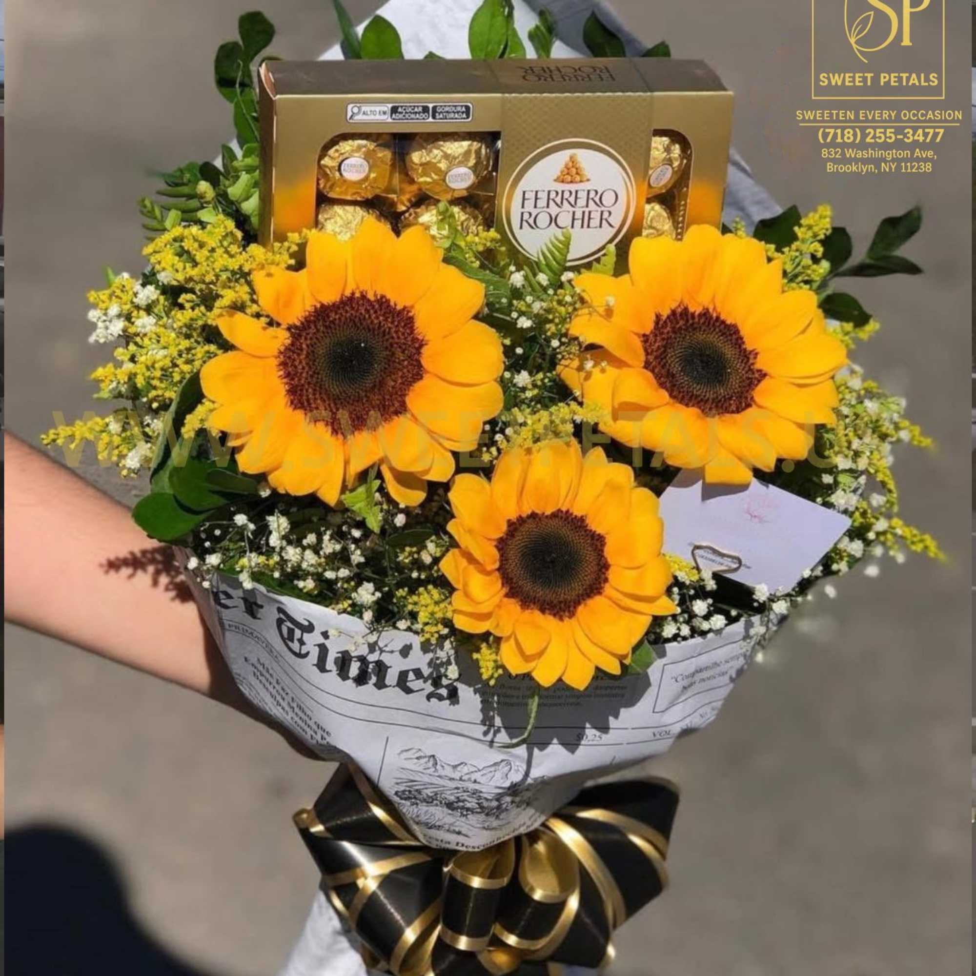 Sunflower bouquet with Ferrero Rocher chocolates and a black-and-gold ribbon
