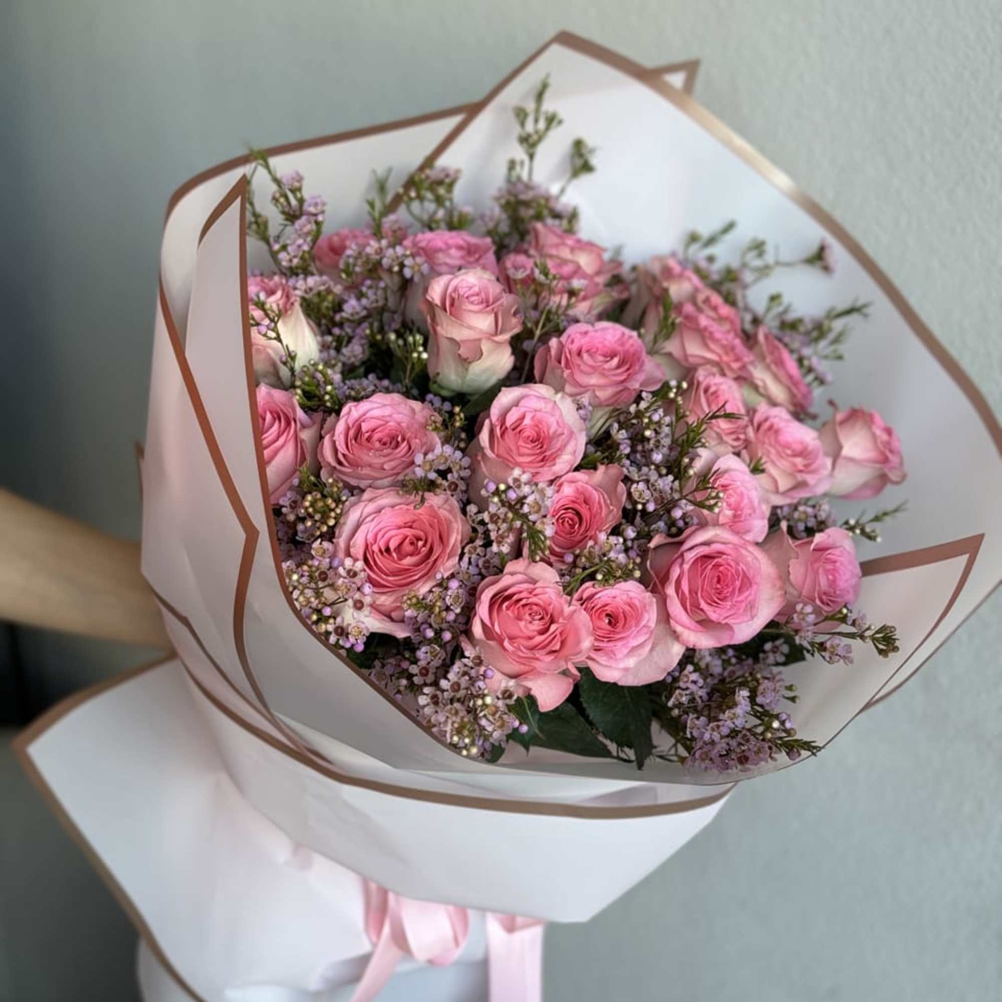 An enchanting hand-held bouquet, featuring 25 Sweet Unique Pink Roses, each petal, photo 2 of 2