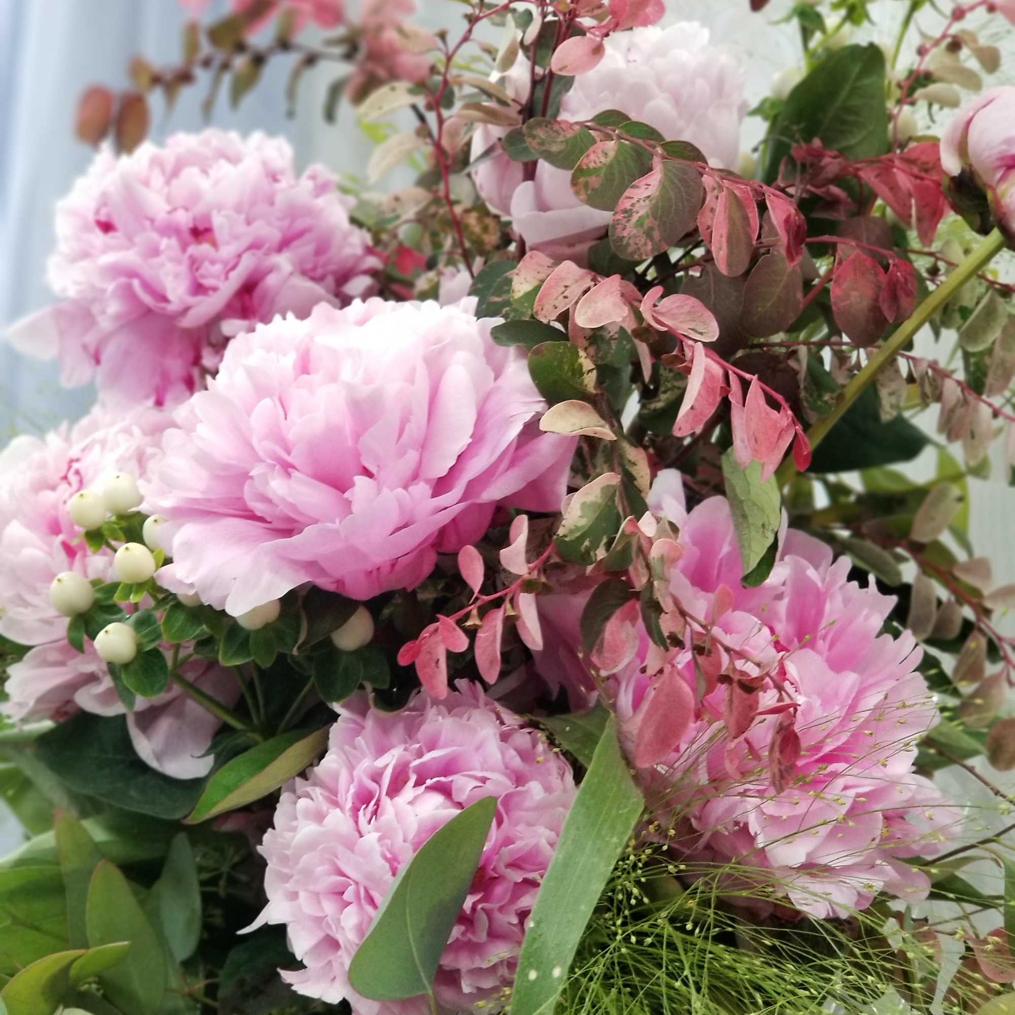 Bundle of peonies with foliages wrapped in bouquet.place in order 1 week