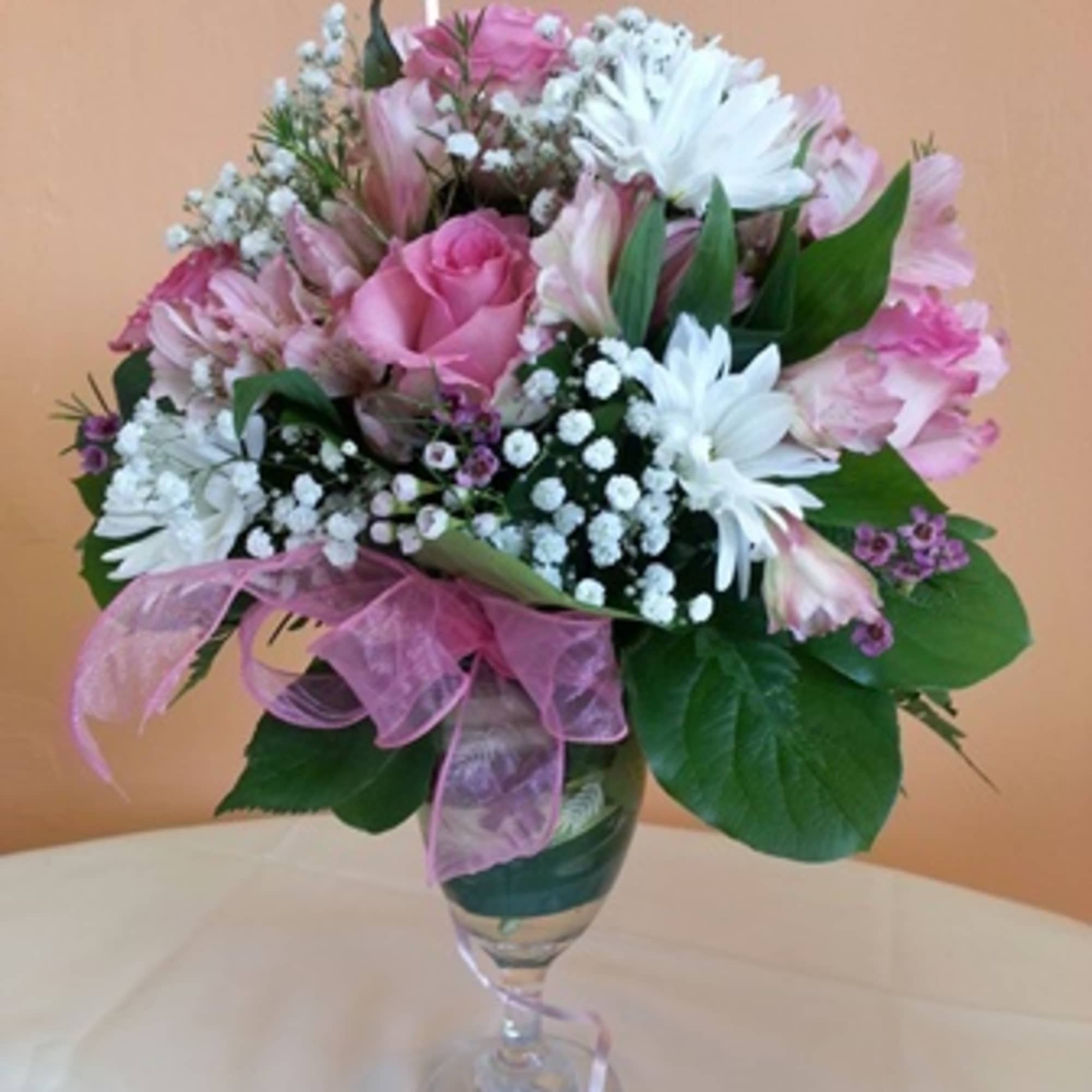 Enlighten someone&#039;s day with the gorgeous vase of blooming vibrancy