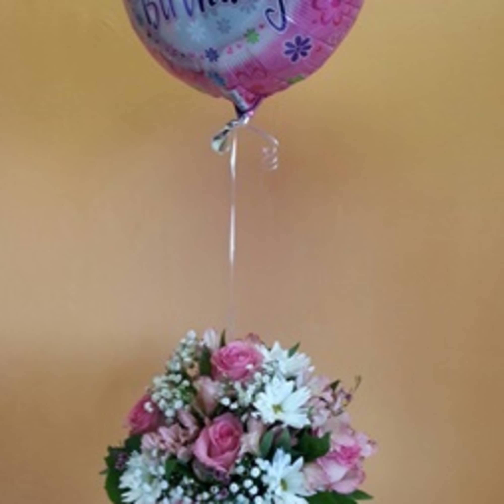 Enlighten someone&#039;s day with the gorgeous vase of blooming vibrancy