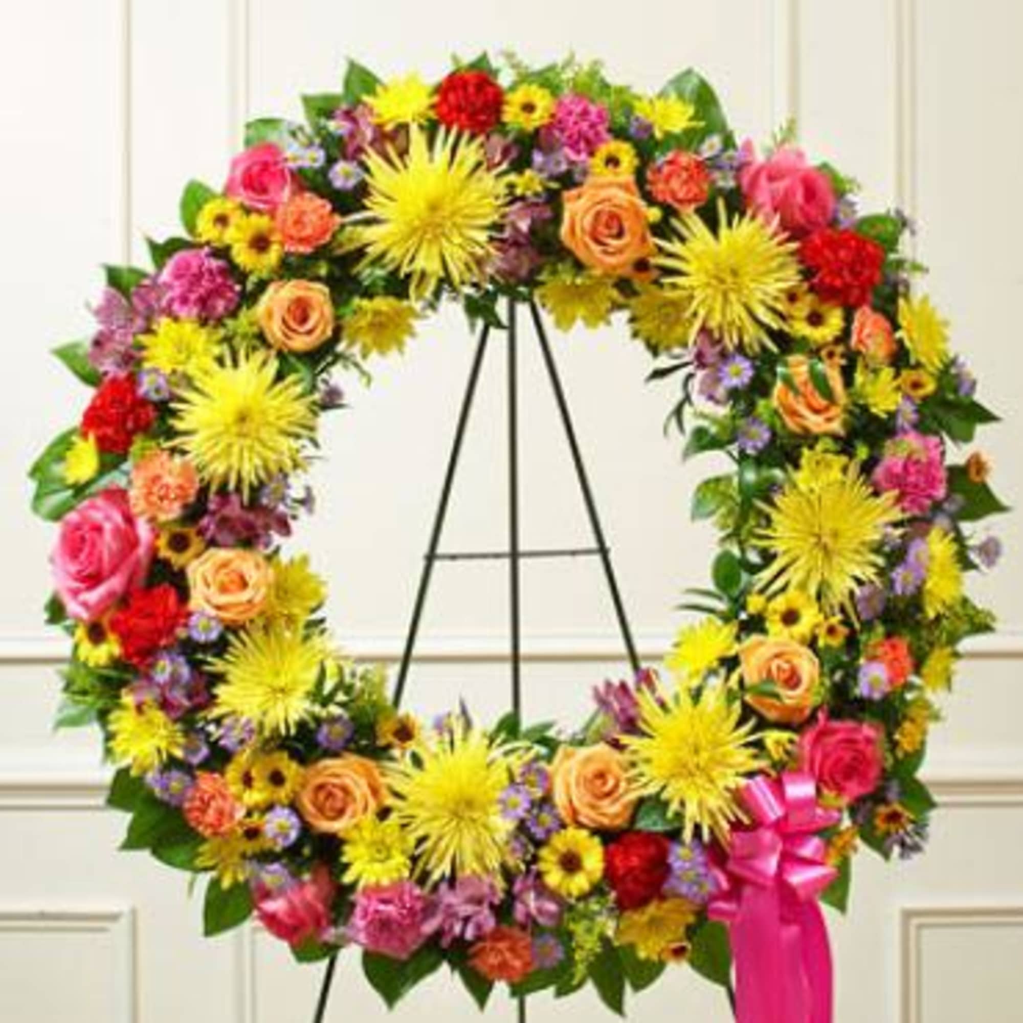 This hand-designed Standing Wreath in elegant bright hues is a beautiful  This hand-designed Standing Wreath in elegant bright hues is a beautiful