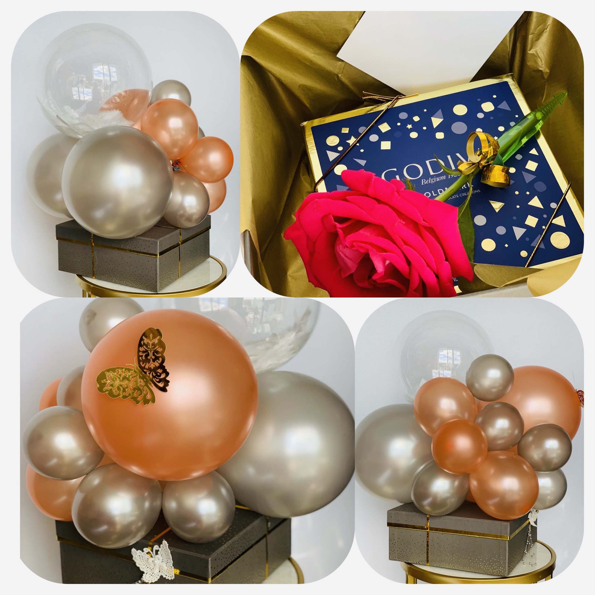 A Godiva chocolate gift box warped with the ribbon and crowned with