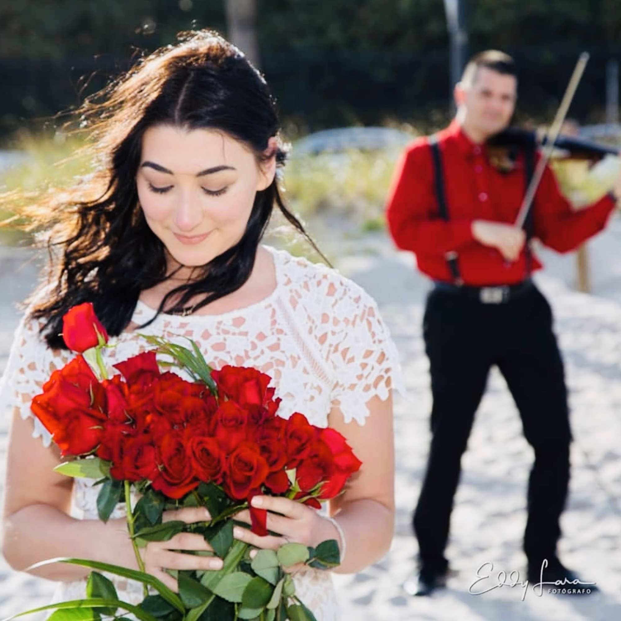 Package includes 100 fresh roses, building from the sand a heart and