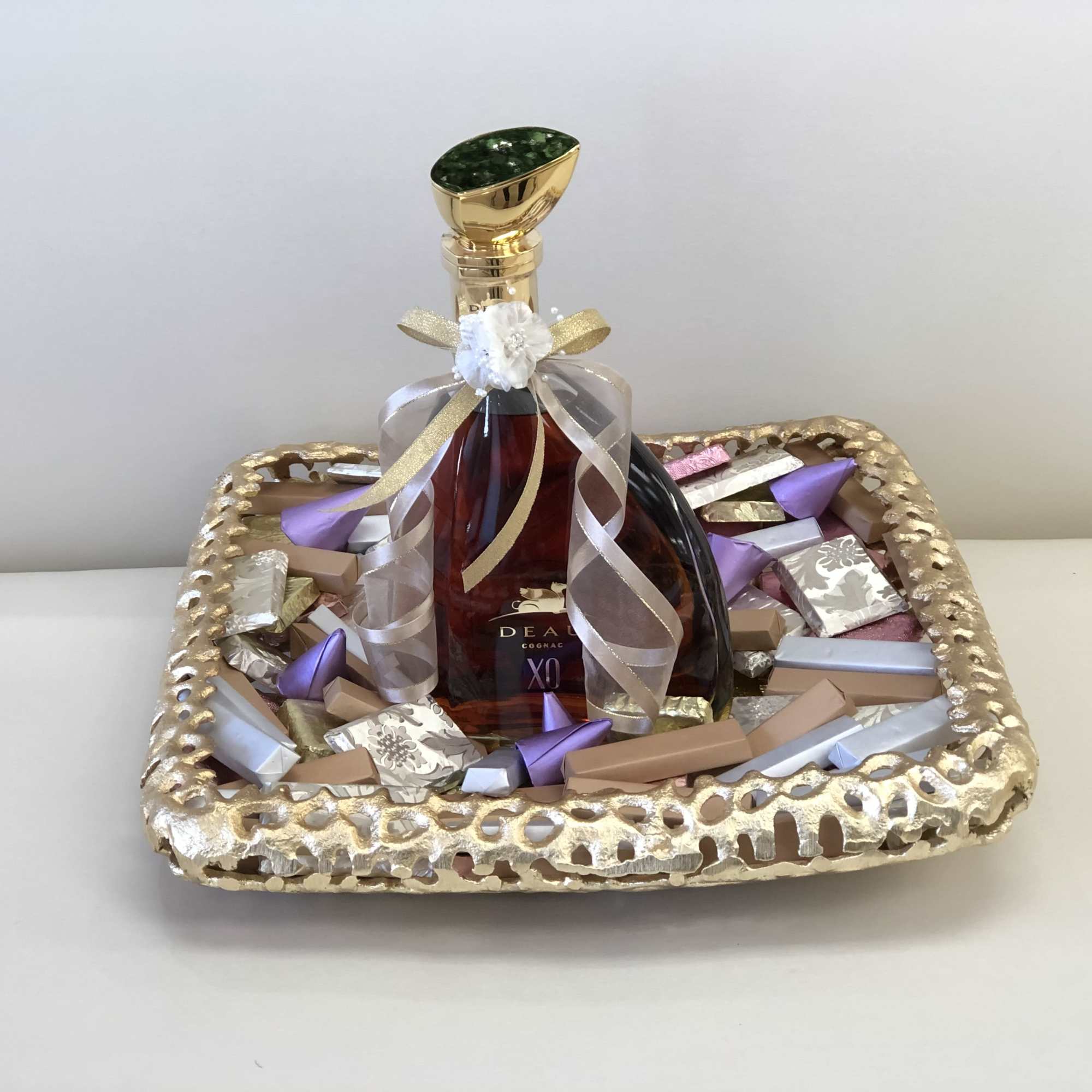 This Chocolato event tray is made in a gold colored mesh tray.