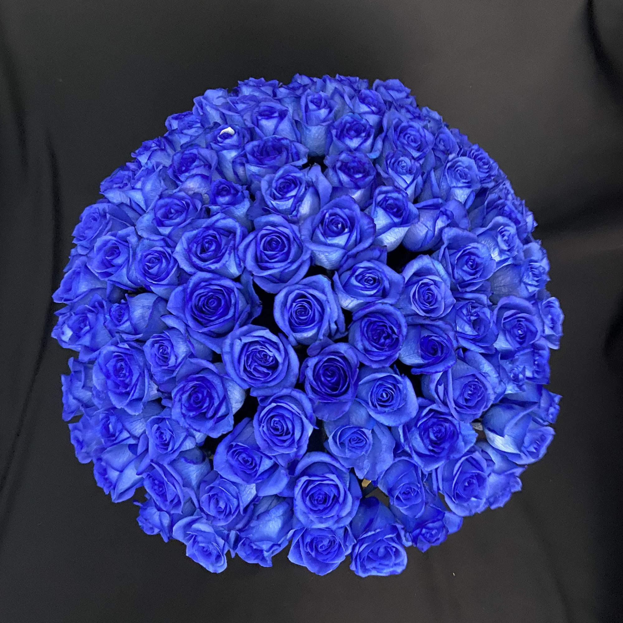 100 Blue Roses in a 12&quot; Glass Cylinder.