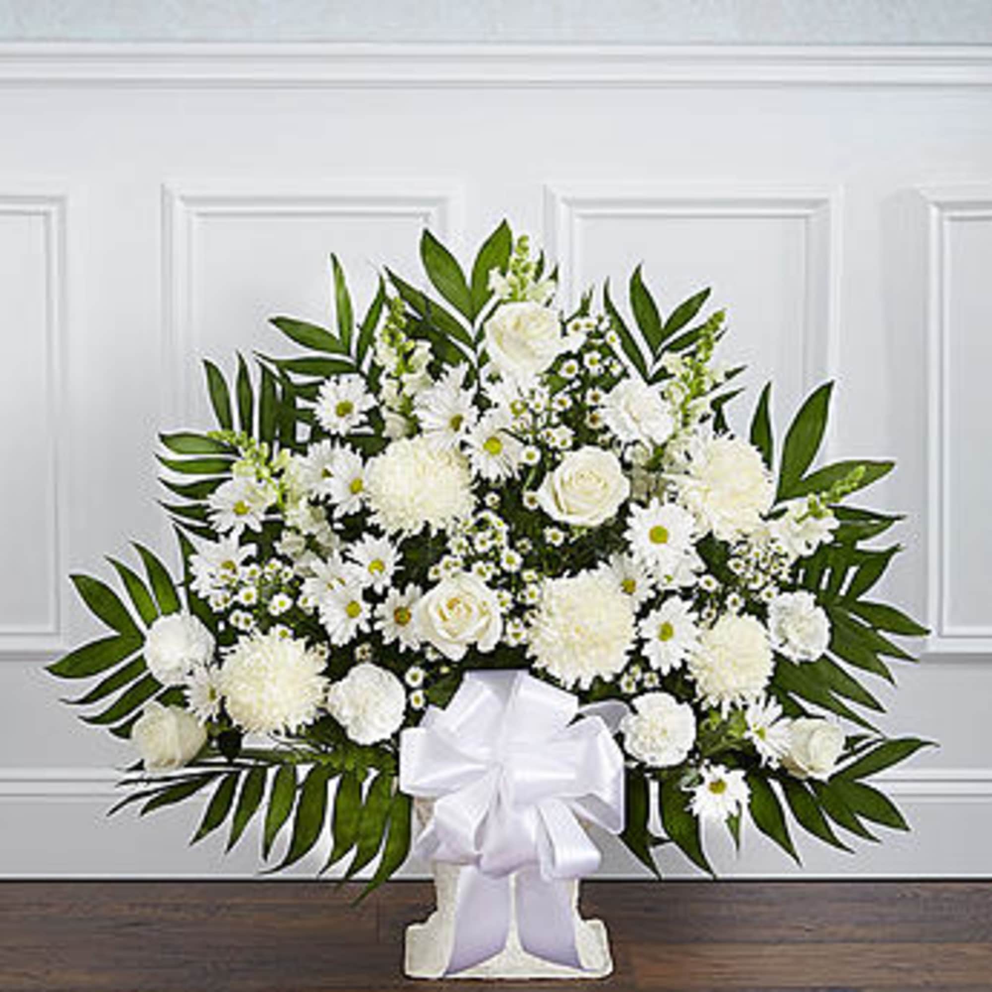 Product ID: 91212


Crafted from striking white blooms, our tasteful floor basket arrangement