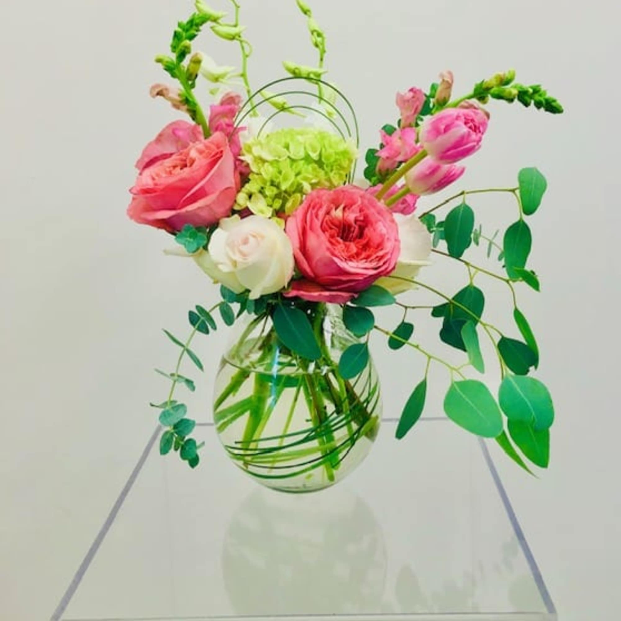 A dainty floral design with a bit of a whimsical touch. 