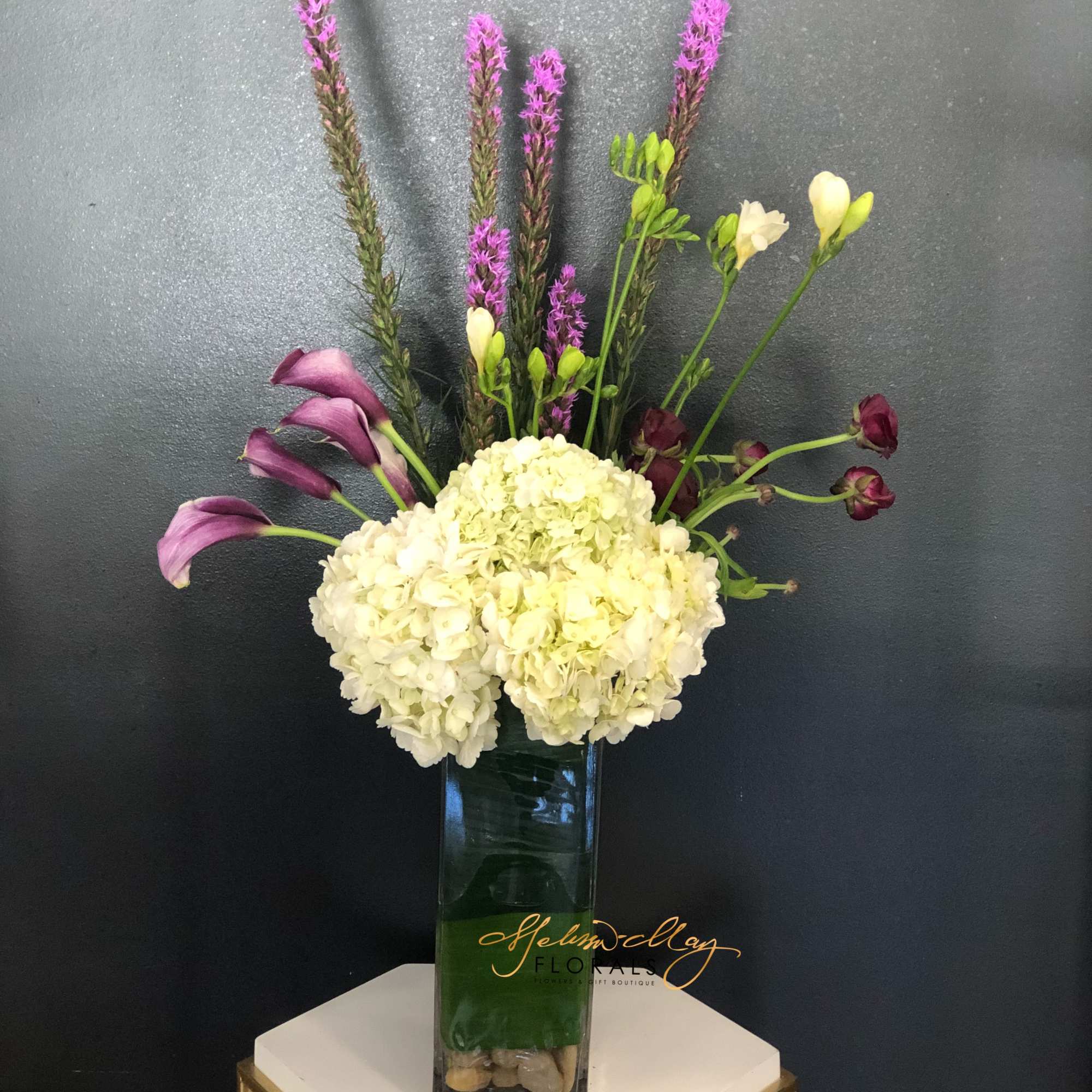 Tall, lovely and just right for any occasion! An artistic mix of