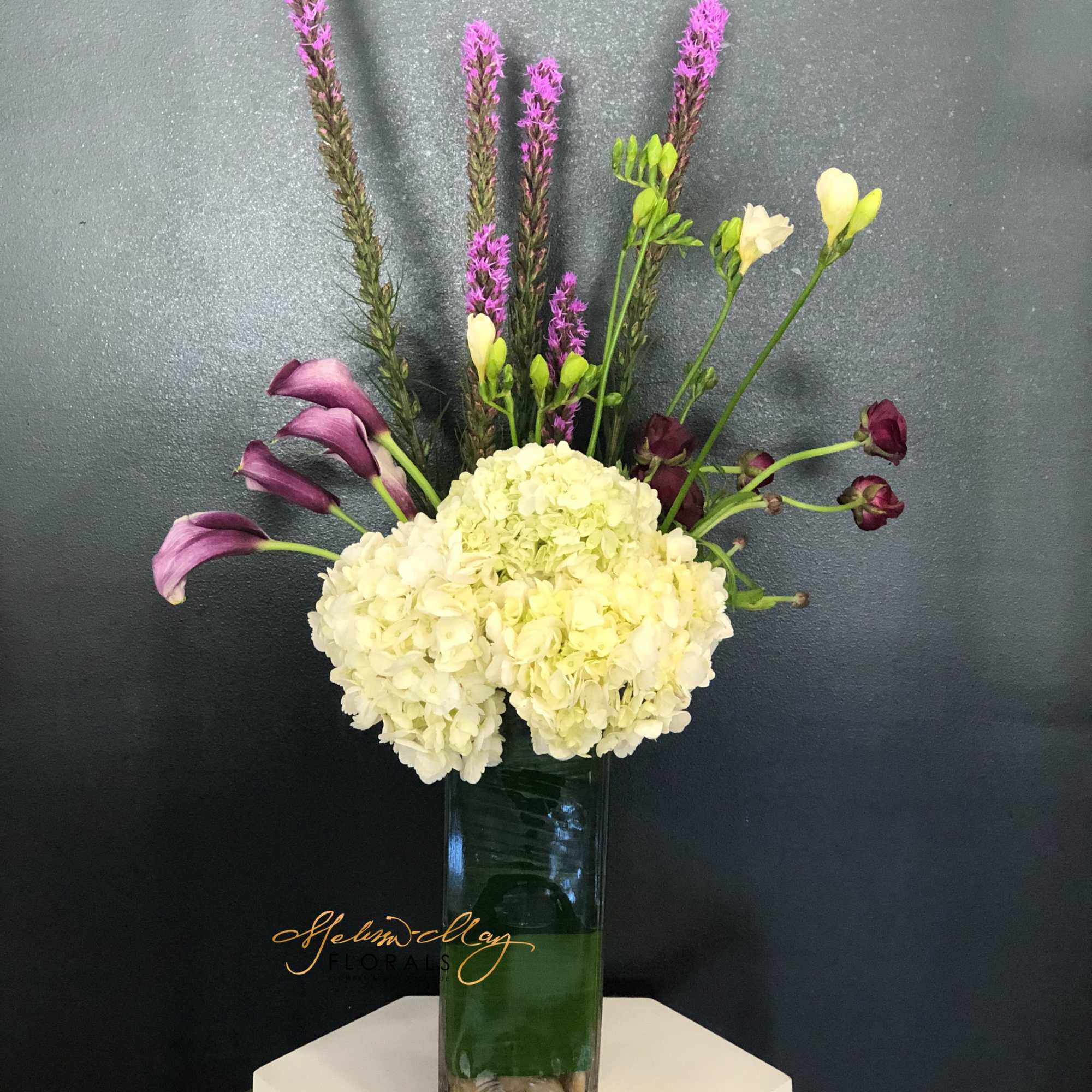 Tall, lovely and just right for any occasion! An artistic mix of