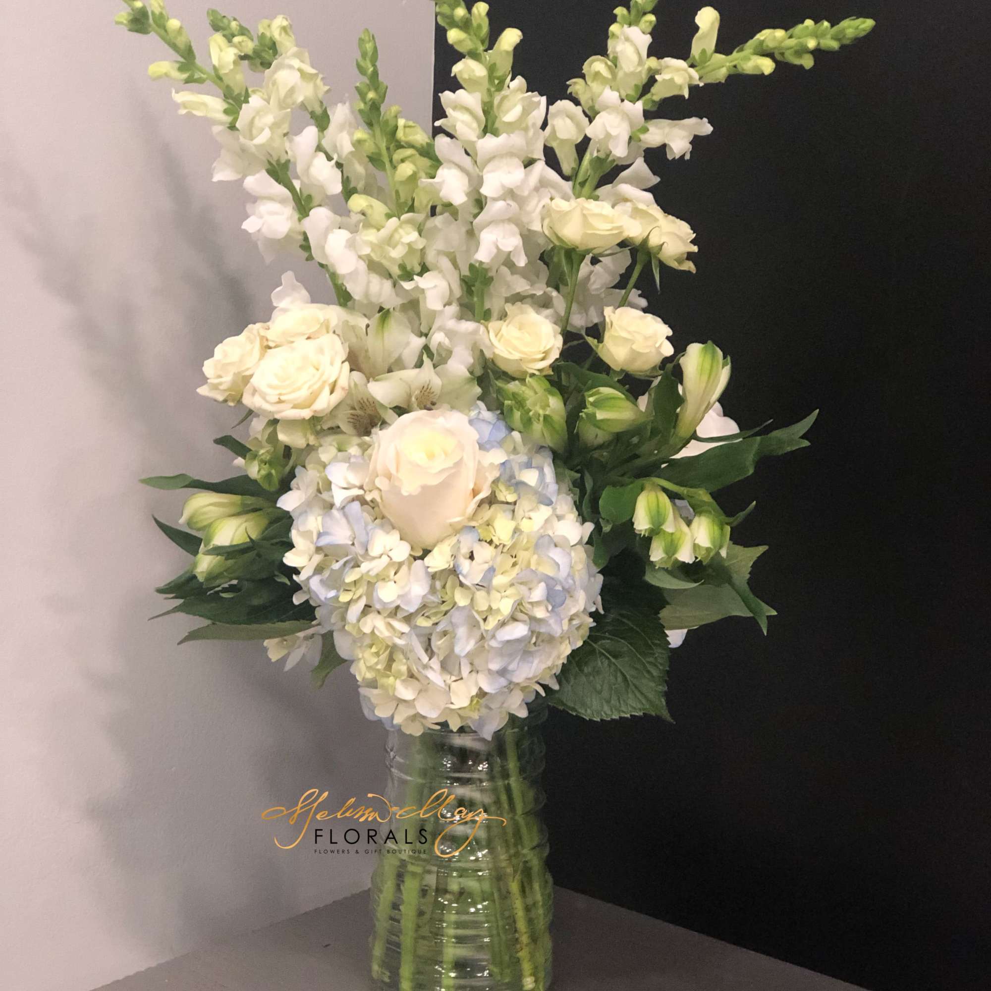 This gorgeous soft-toned arrangement will bring back wishful feelings of magical days