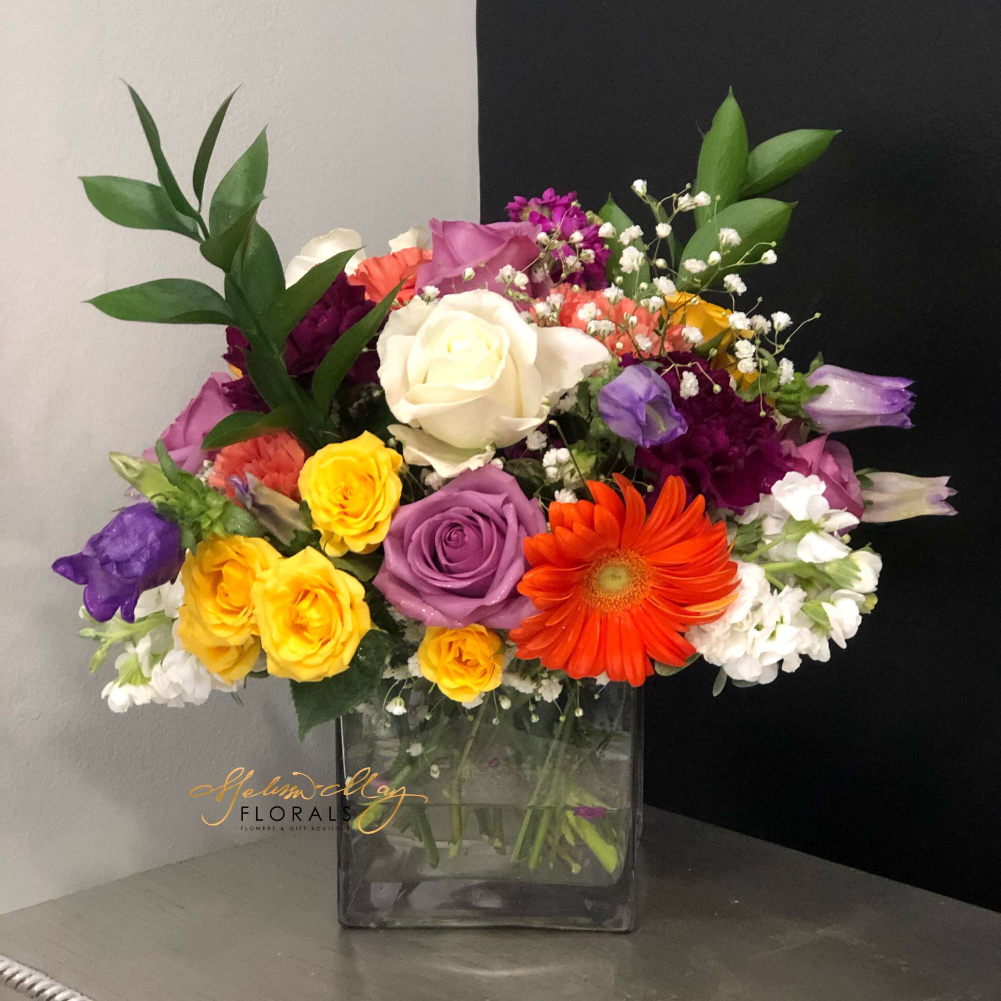 A vivid and rich blend of colorful flowers that is sure to