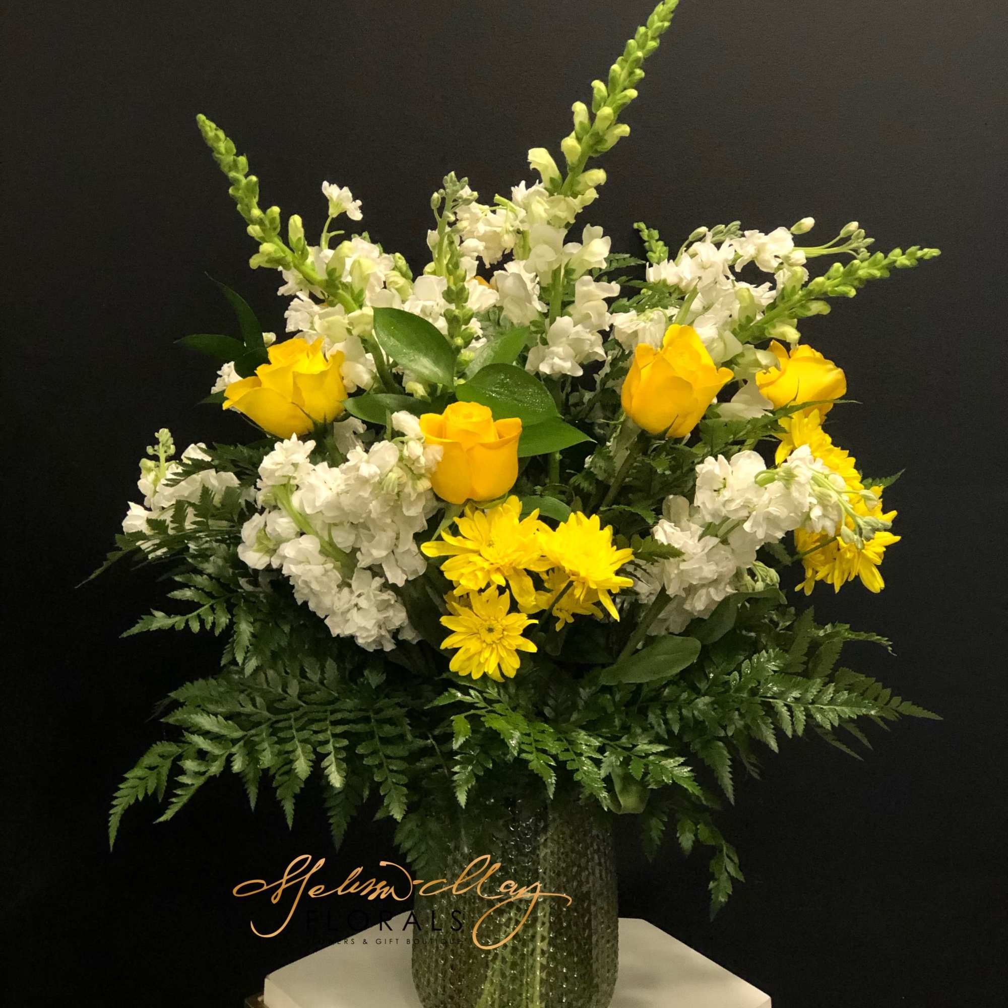 This is for the sunshine of your life. This arrangement has Bright