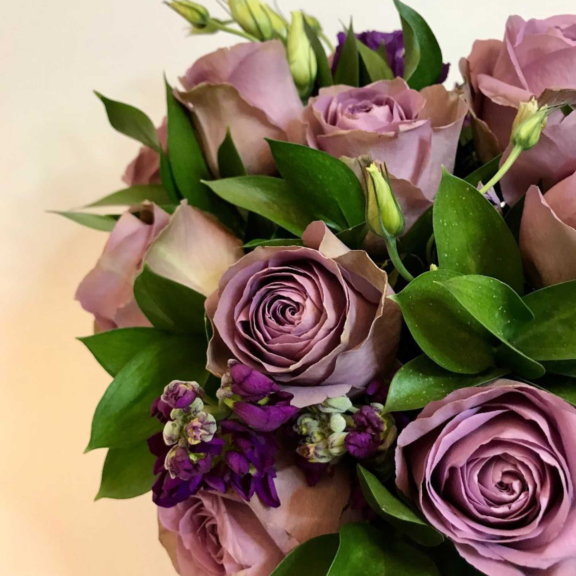 For the person that loves purple:  purple roses, purple lisianthus, stock