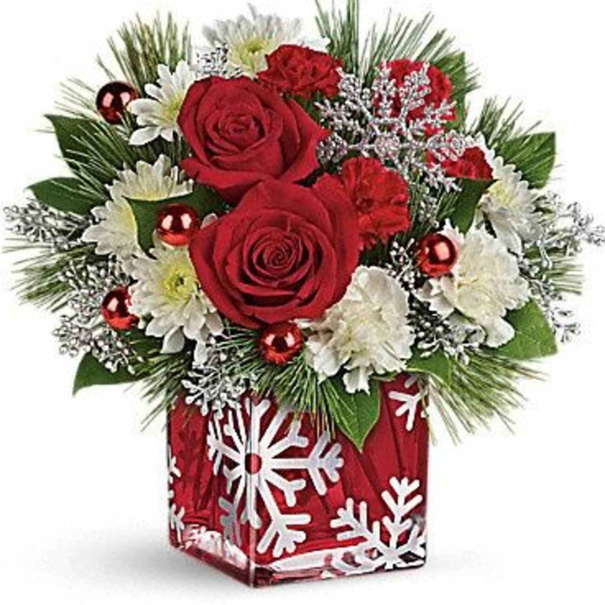 
Deck the halls with this festive arrangement of rich red roses, winter