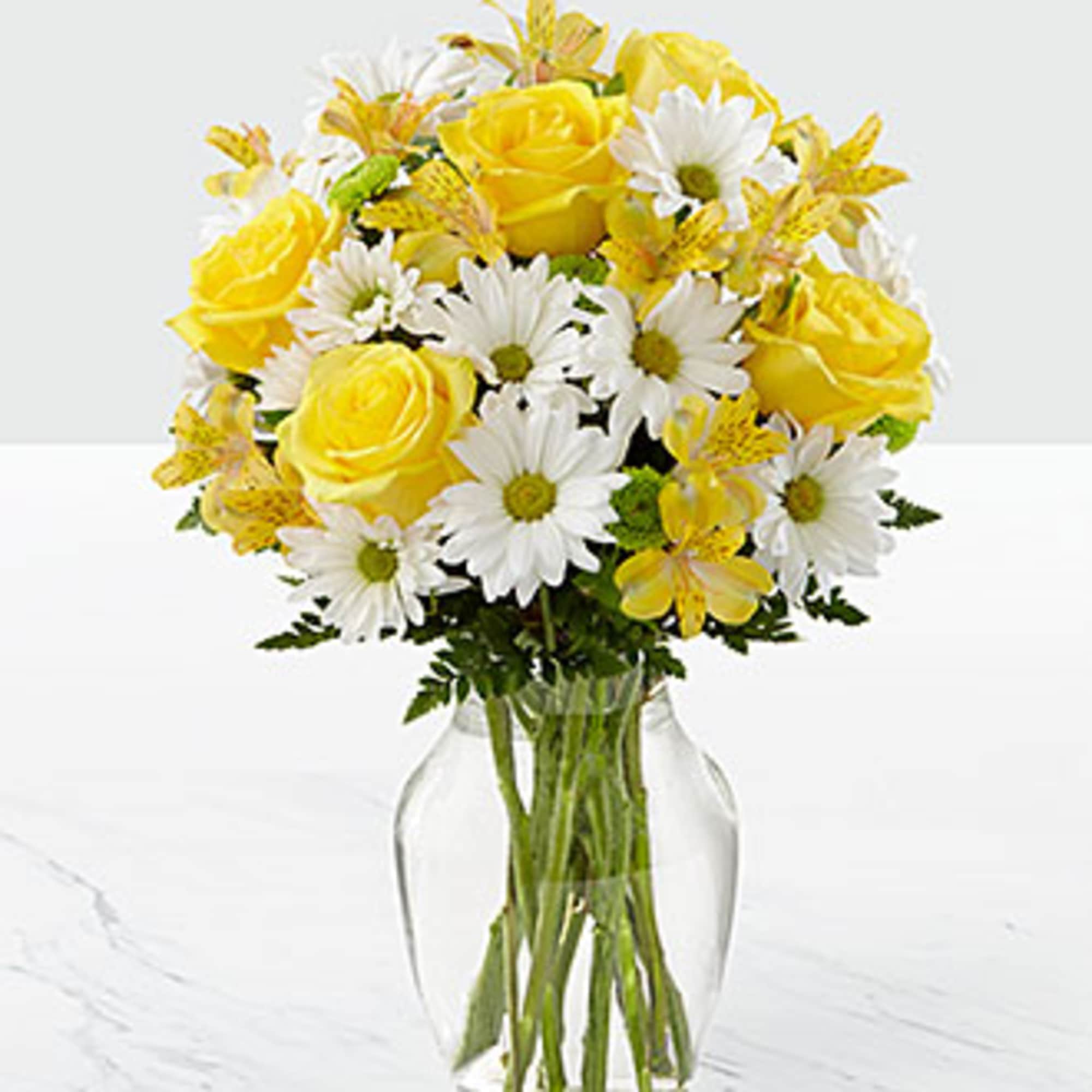 The FTD Sunny Sentiments Bouquet is a blooming expression of charming cheer.