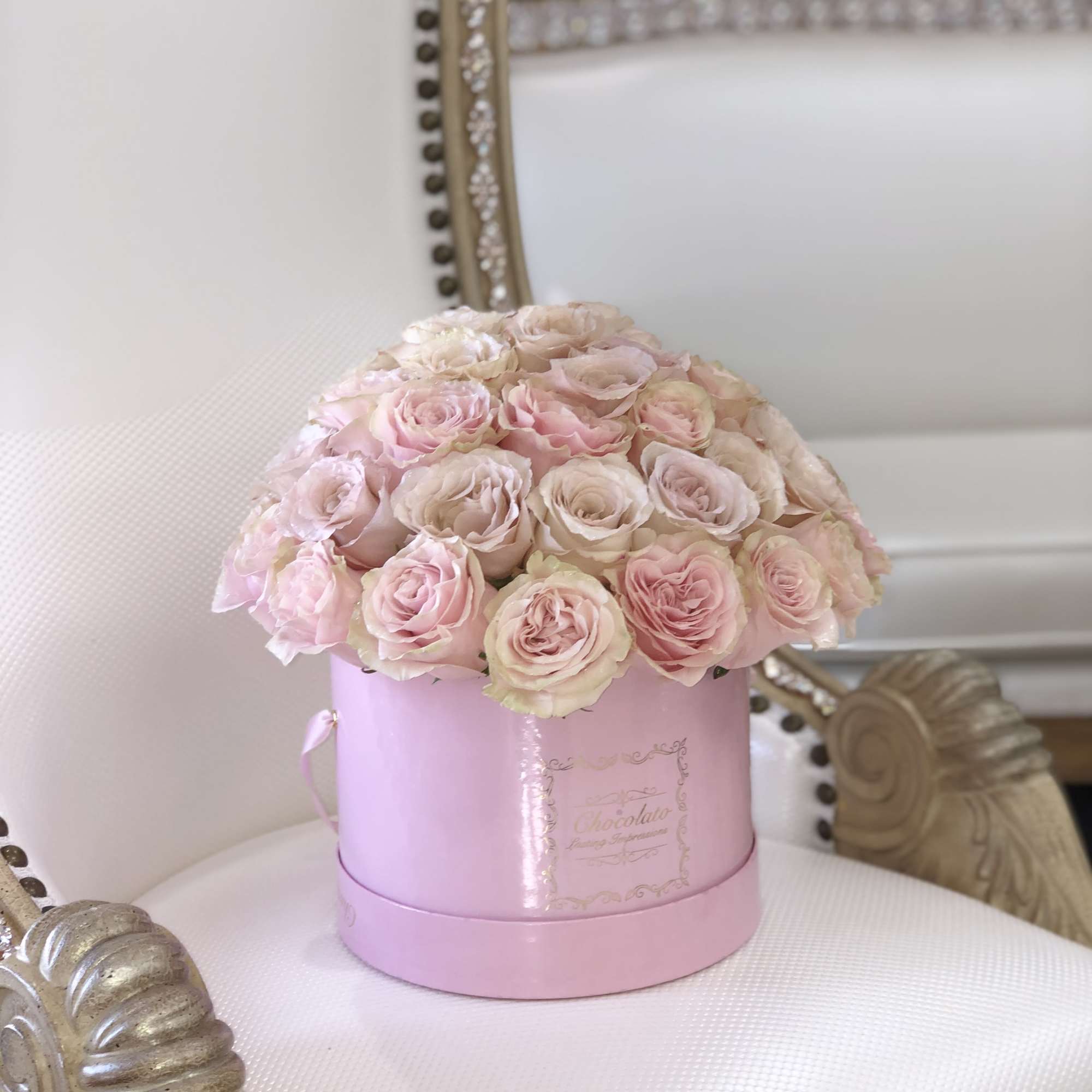 This Chocolato arrangement is made with Pink Roses. The arrangement comes in