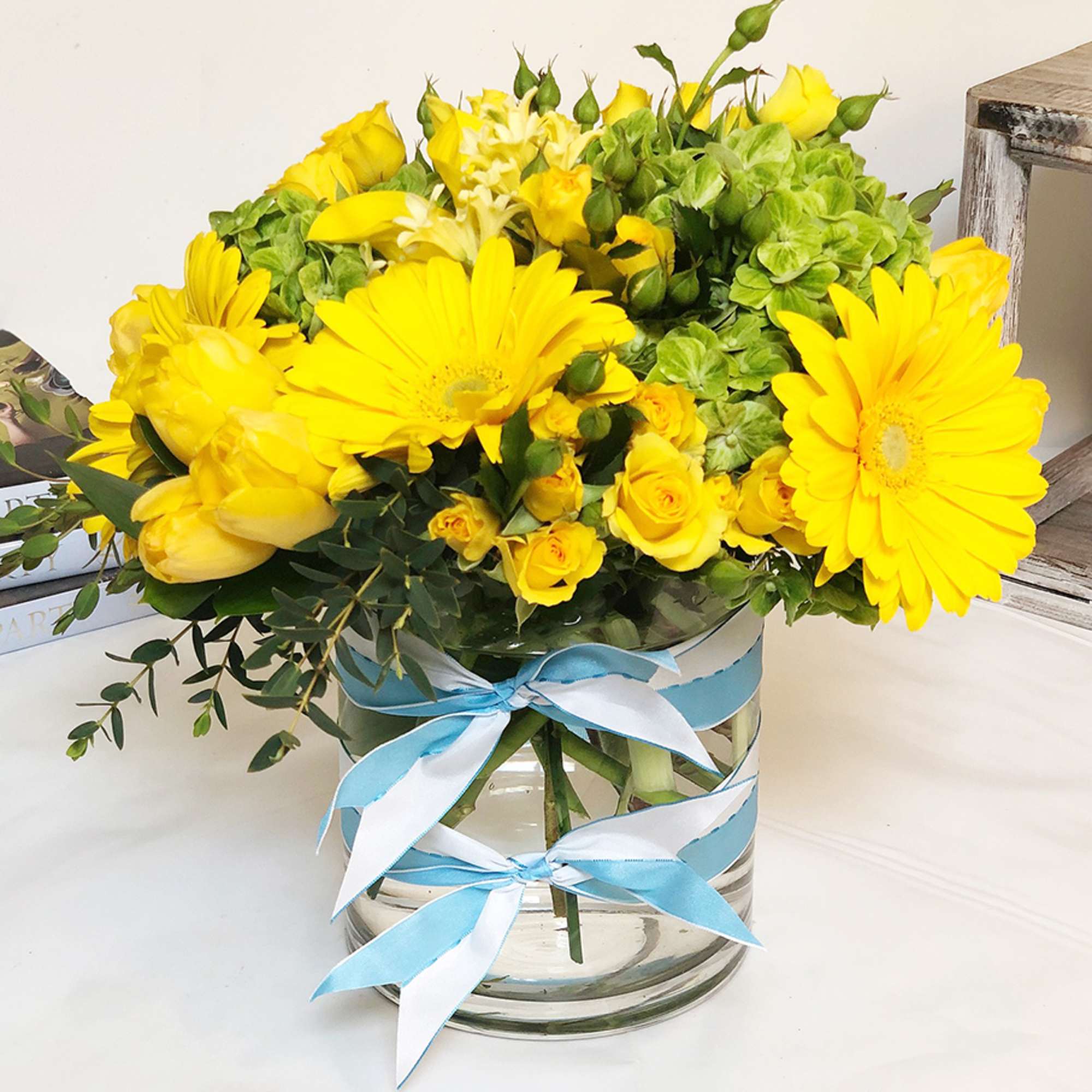 The perfect arrangement for that sunny person in your life. Tulips, Ranunculus