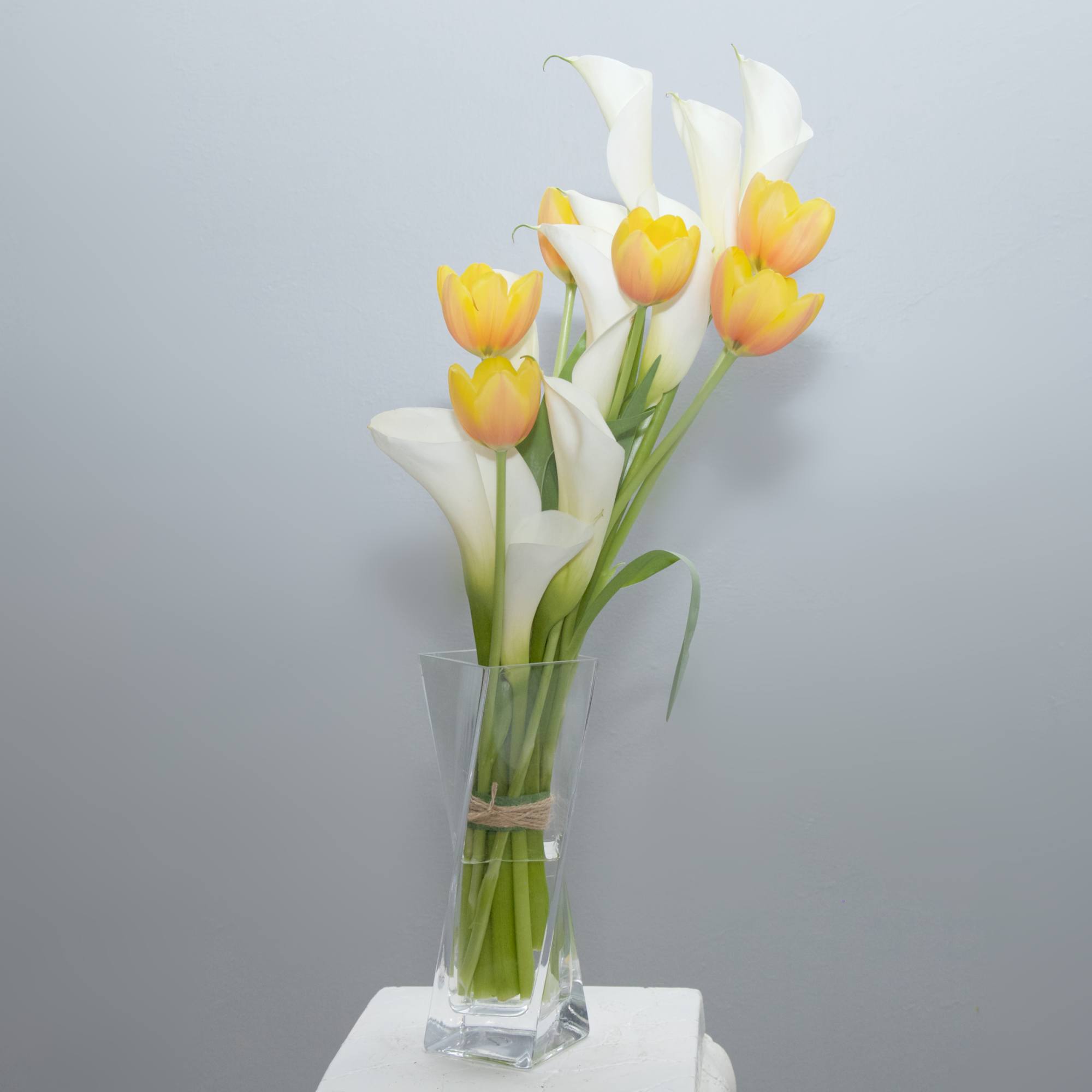 A stunningly architectural arrangement designed with grace and style - Calla Lilies