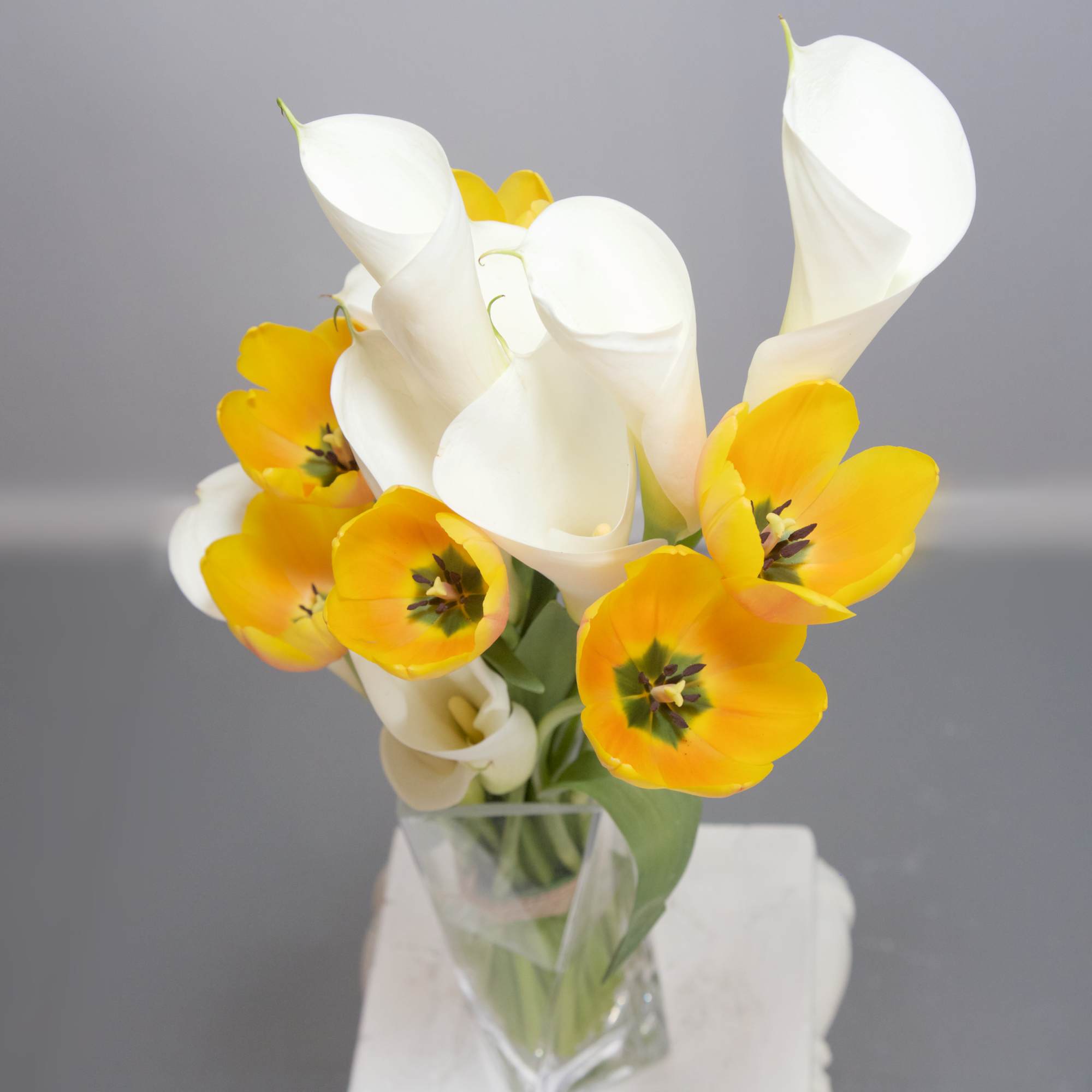 A stunningly architectural arrangement designed with grace and style - Calla Lilies