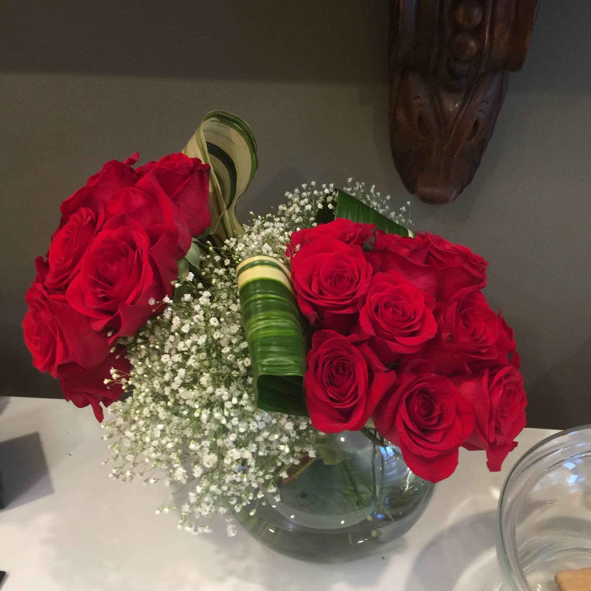 2 dozen of reds roses in 2 bundles.