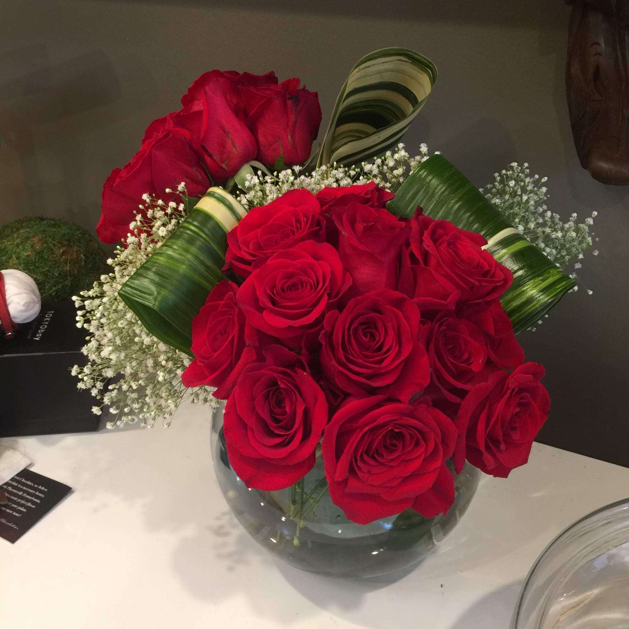 2 dozen of reds roses in 2 bundles.
