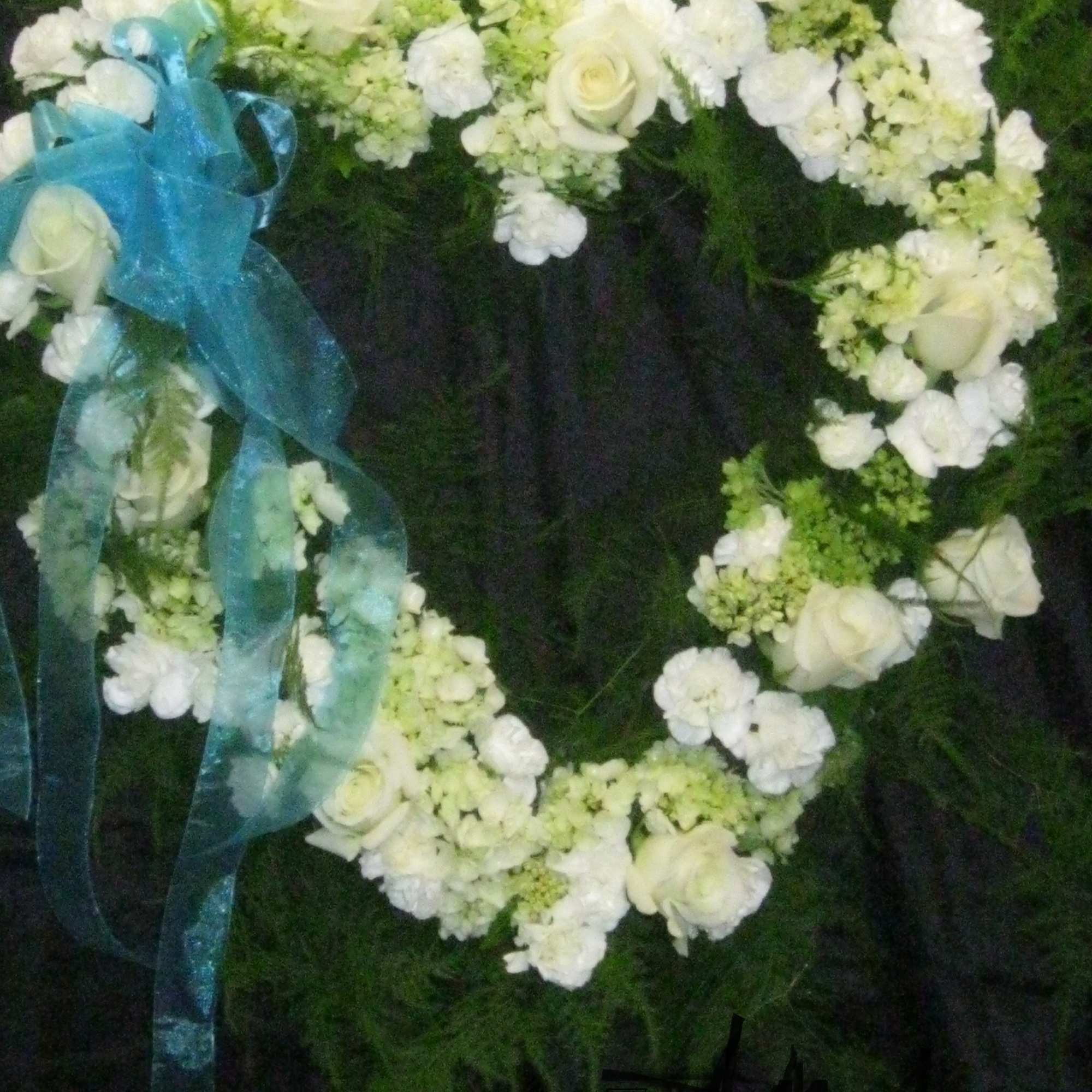 An expression of love in grenn and white,  This graceful heart An expression of love in grenn and white,  This graceful heart