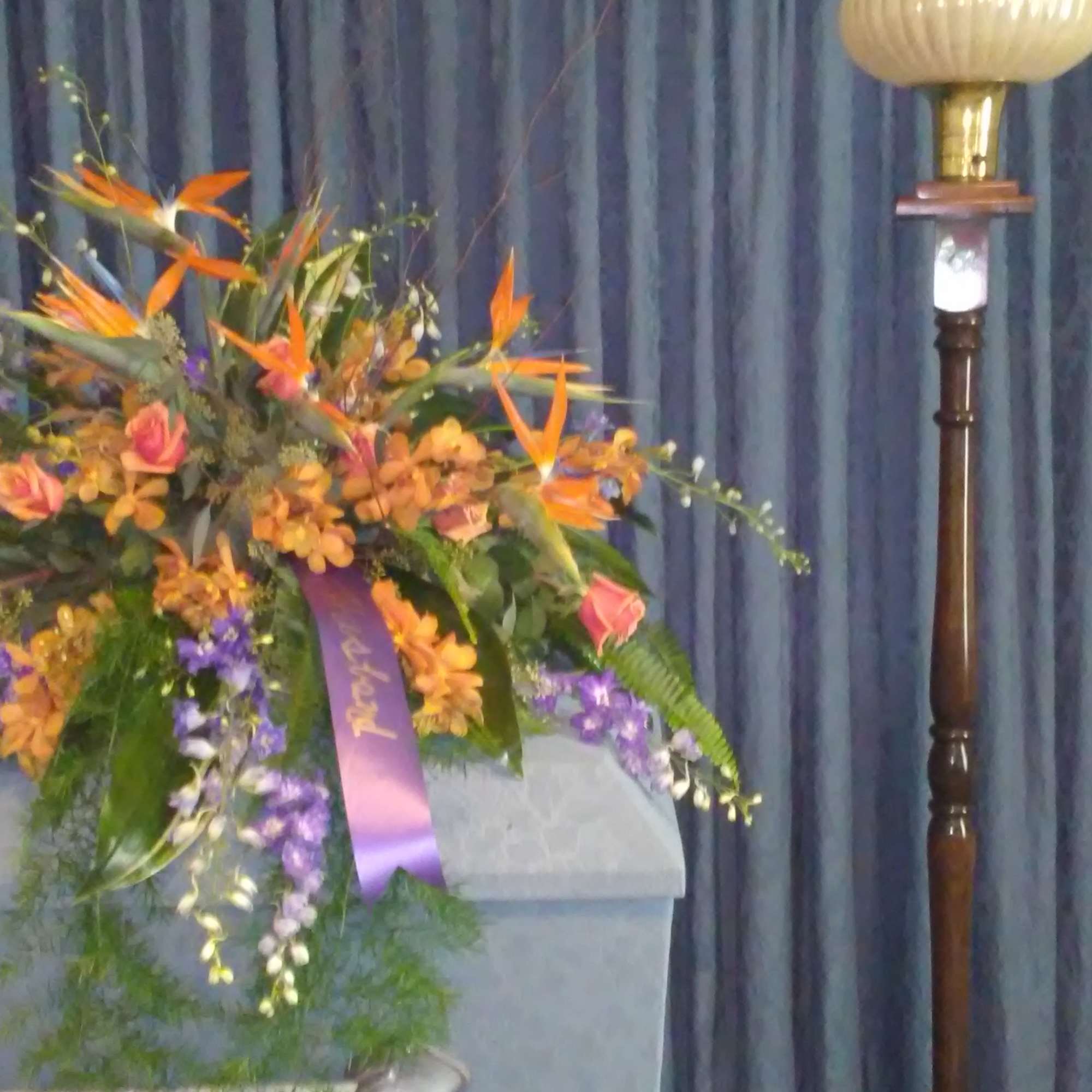 This casket cover, done for a lover of the tropics, is a This casket cover, done for a lover of the tropics, is a