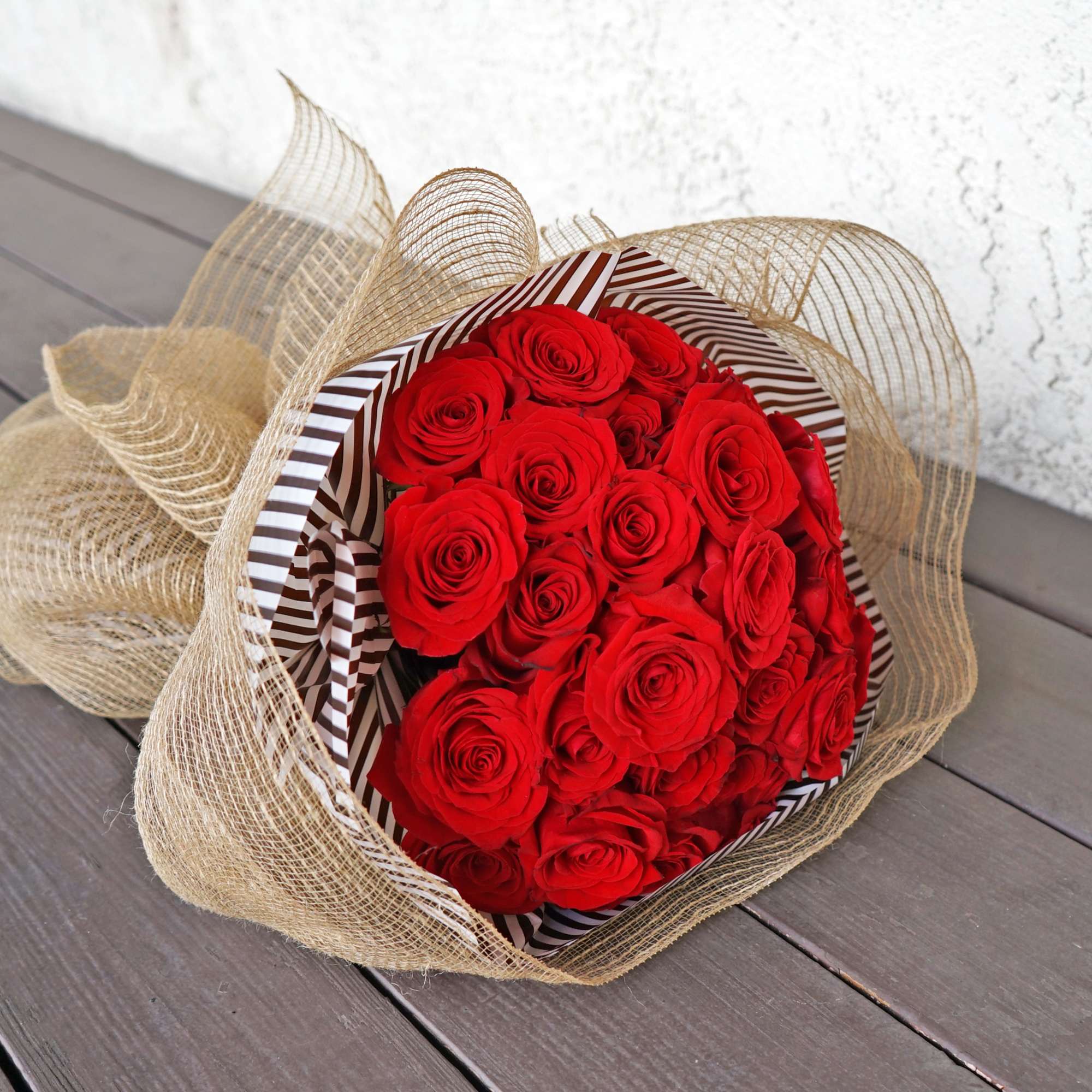 2 Dozen Premium Red Roses wrapped in rustic burlap for a vintage