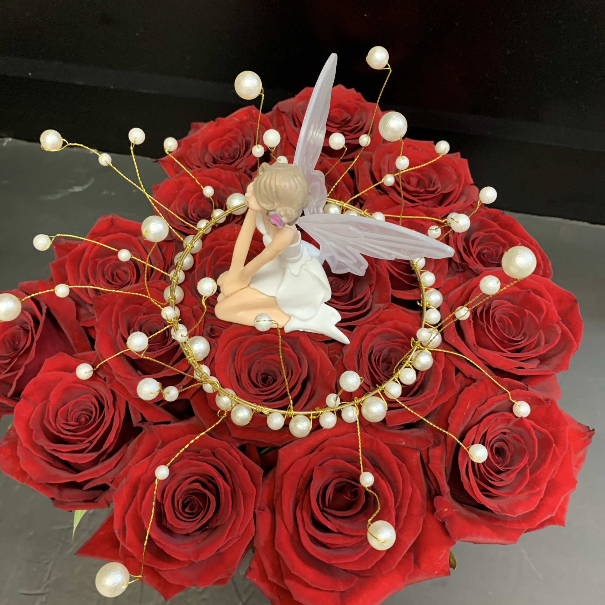 More than two dozen roses