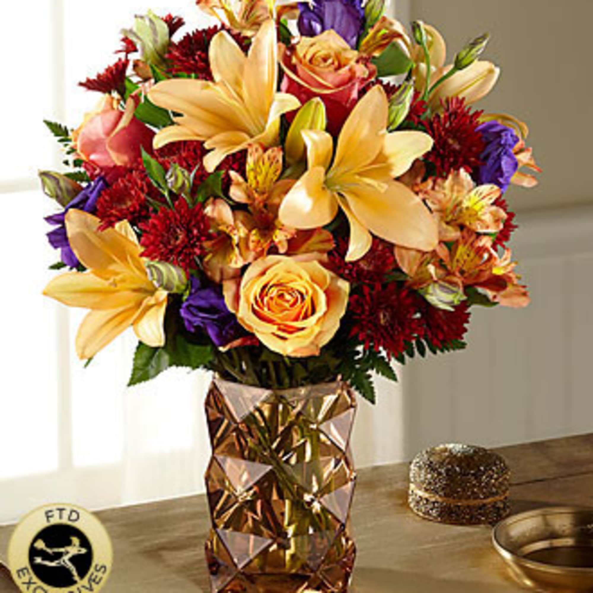 Captivating fall color abounds in this simply stunning autumn bouquet, helping you Captivating fall color abounds in this simply stunning autumn bouquet, helping you
