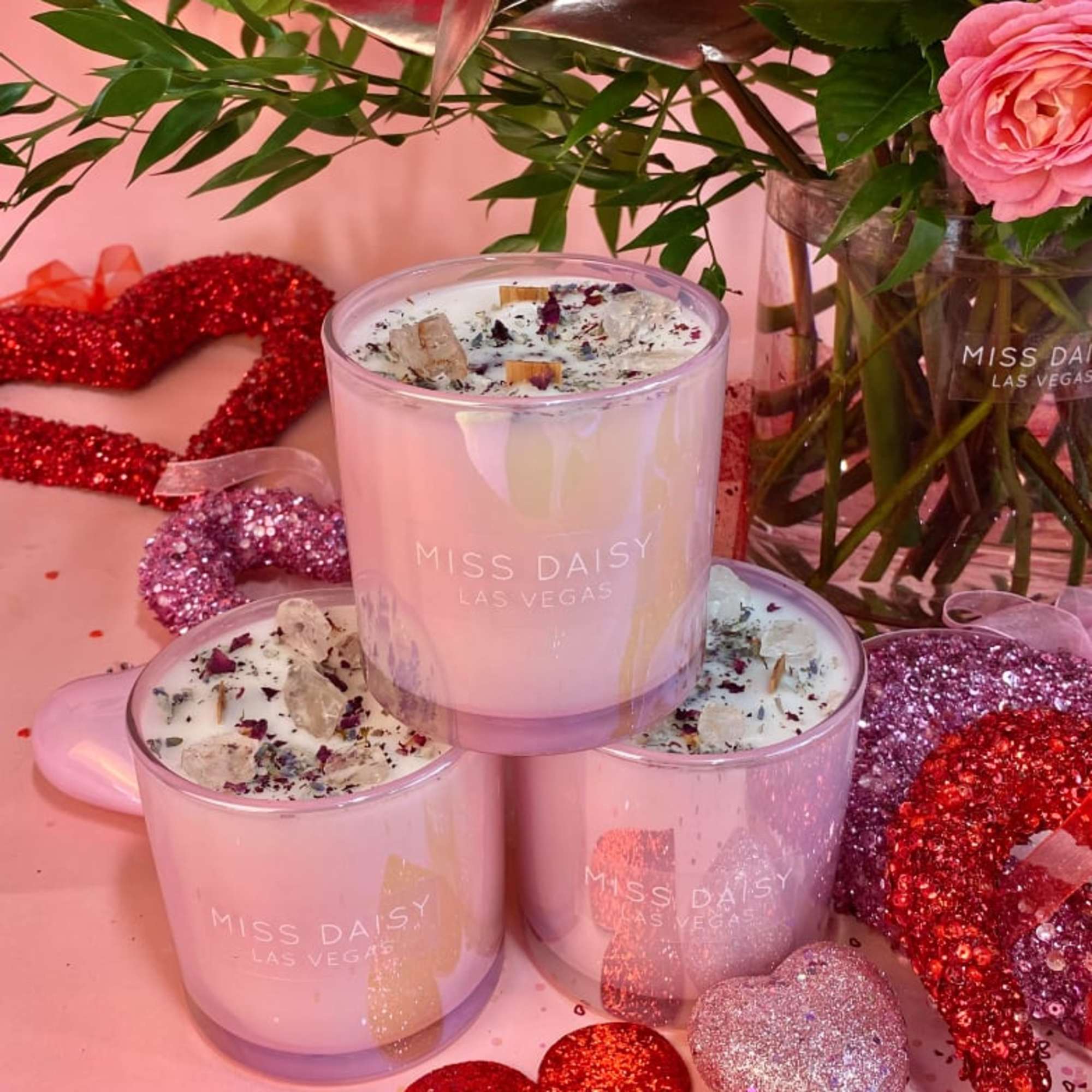 This large candle is filled with dried rose petals, rose essential oils