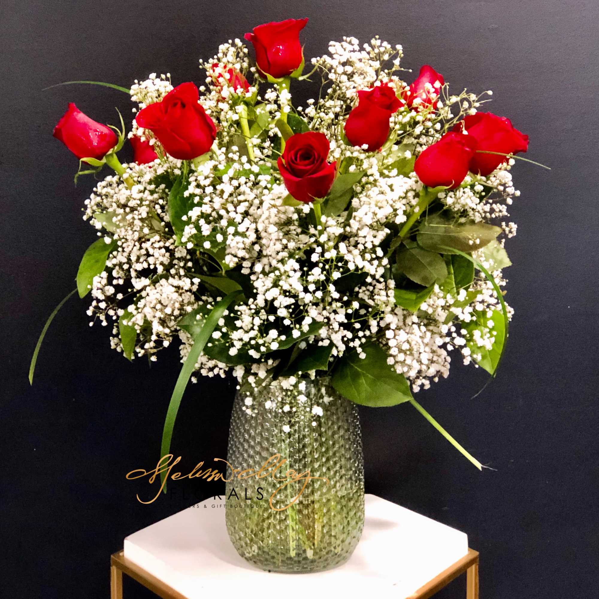 Surprise someone with our &quot;Sweetheart Sensation&quot; arrangement consisting of 14 roses that