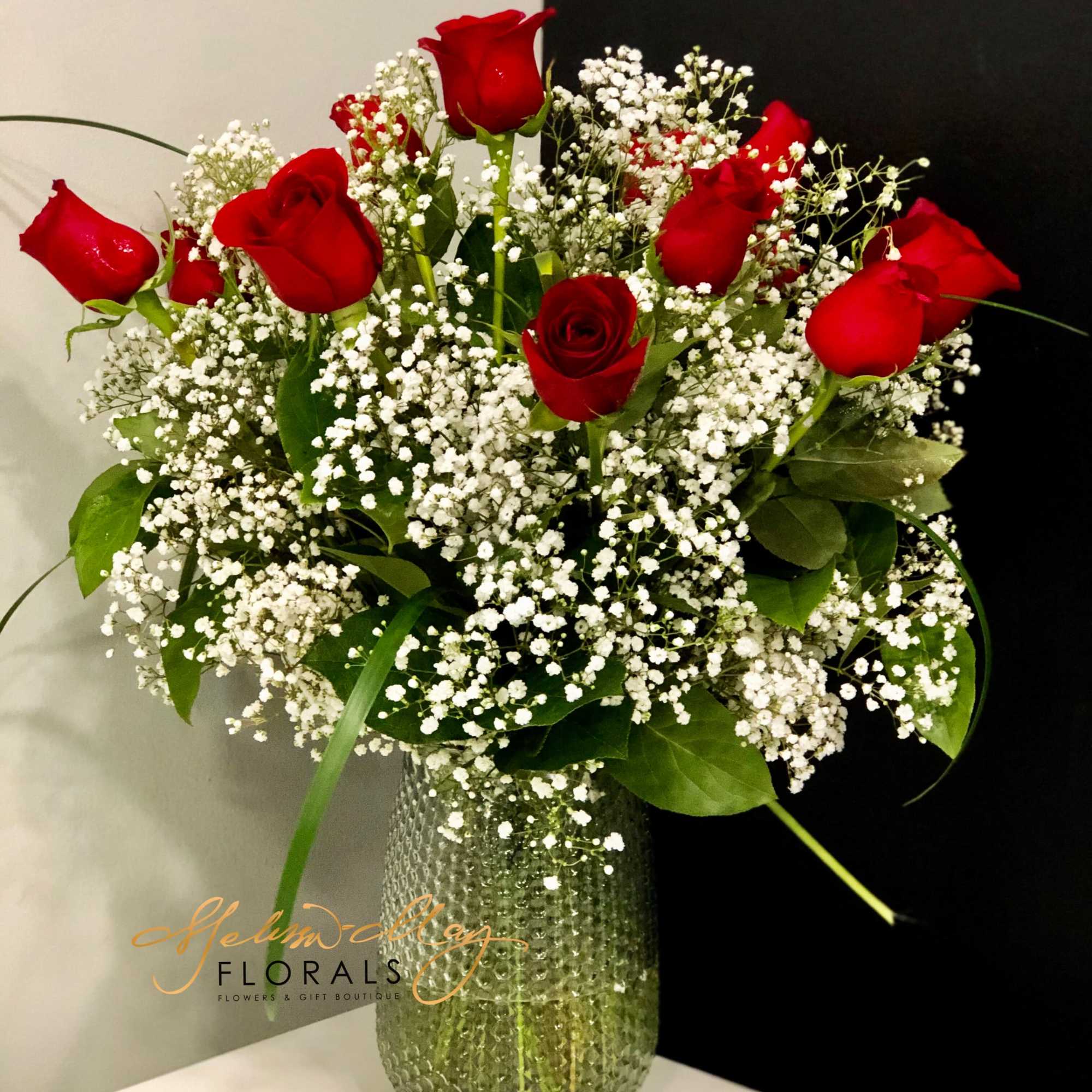 Surprise someone with our &quot;Sweetheart Sensation&quot; arrangement consisting of 14 roses that