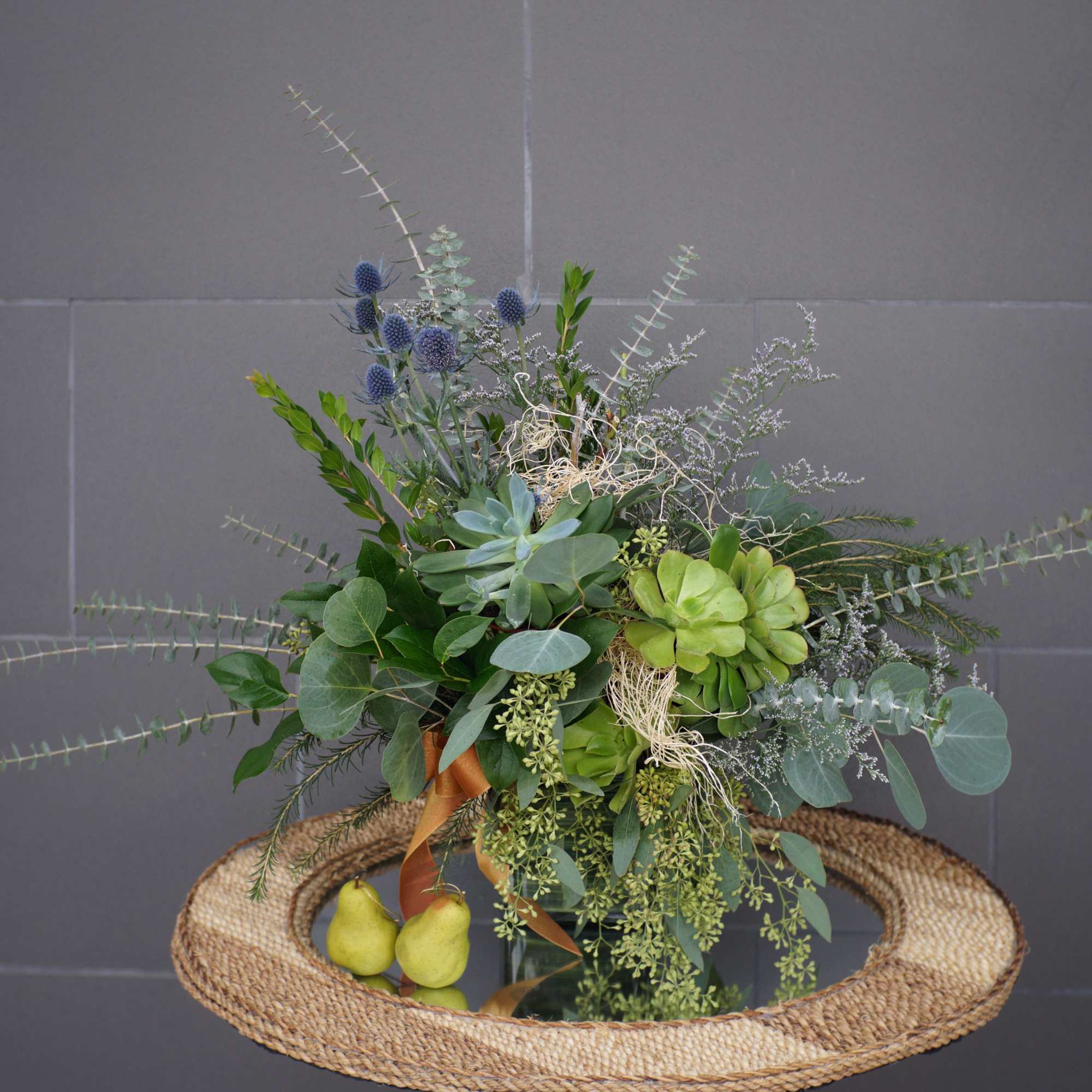 A little green island with succulents, sea holly and assorted greens
STANDARD: FIRST