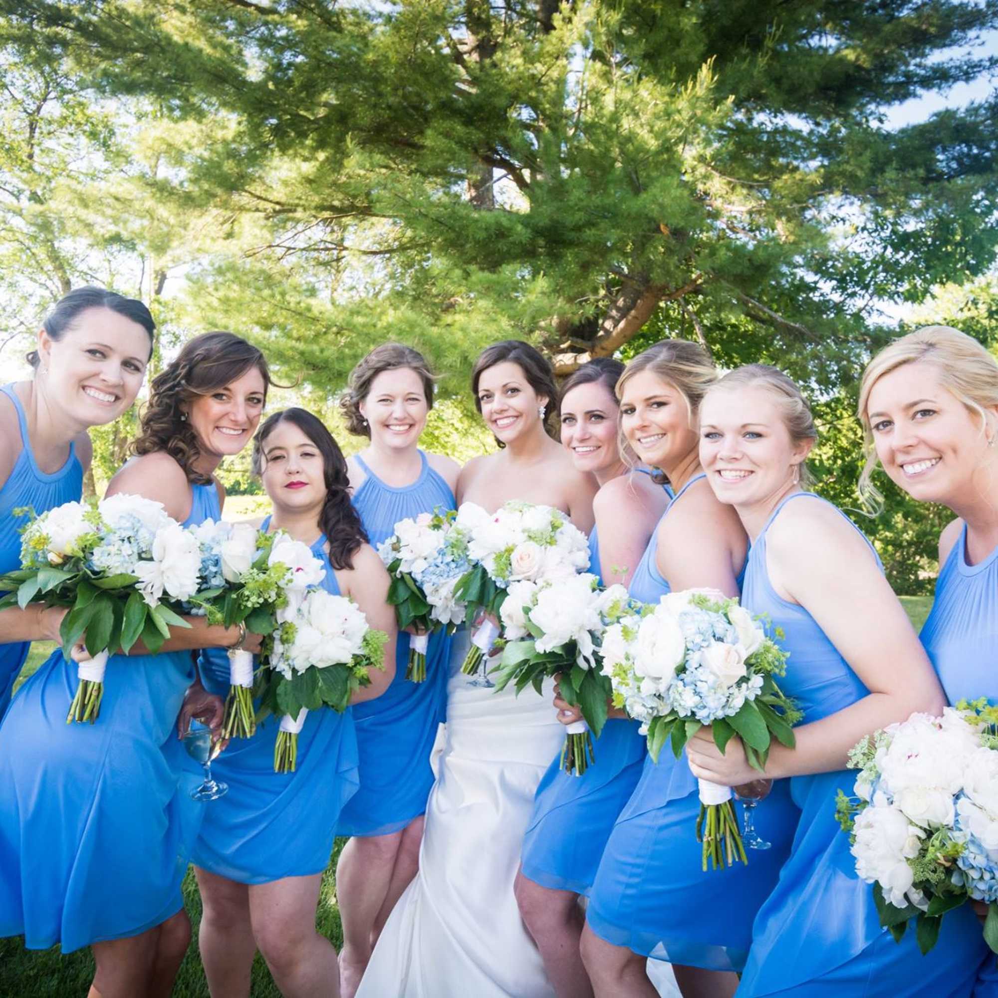 Hand tied bouquets of Hydrangea and Garden Roses for the Bridal Party.