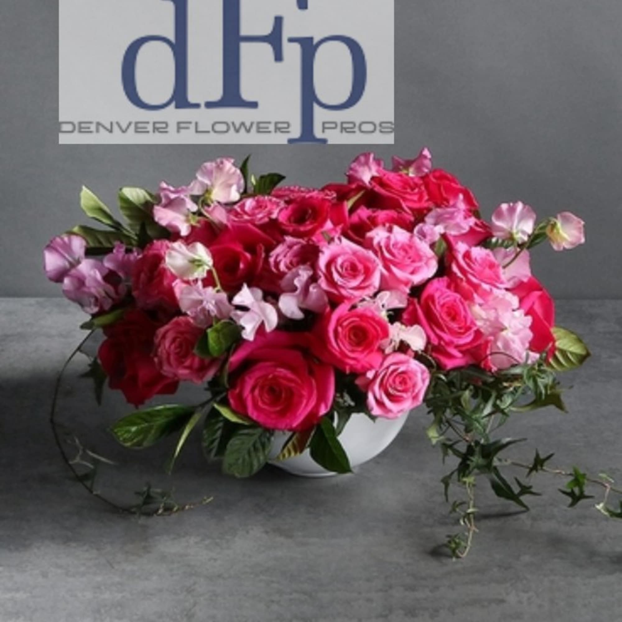 This arrangement is a mixture of 2 dozen premium Fair Trade Pink