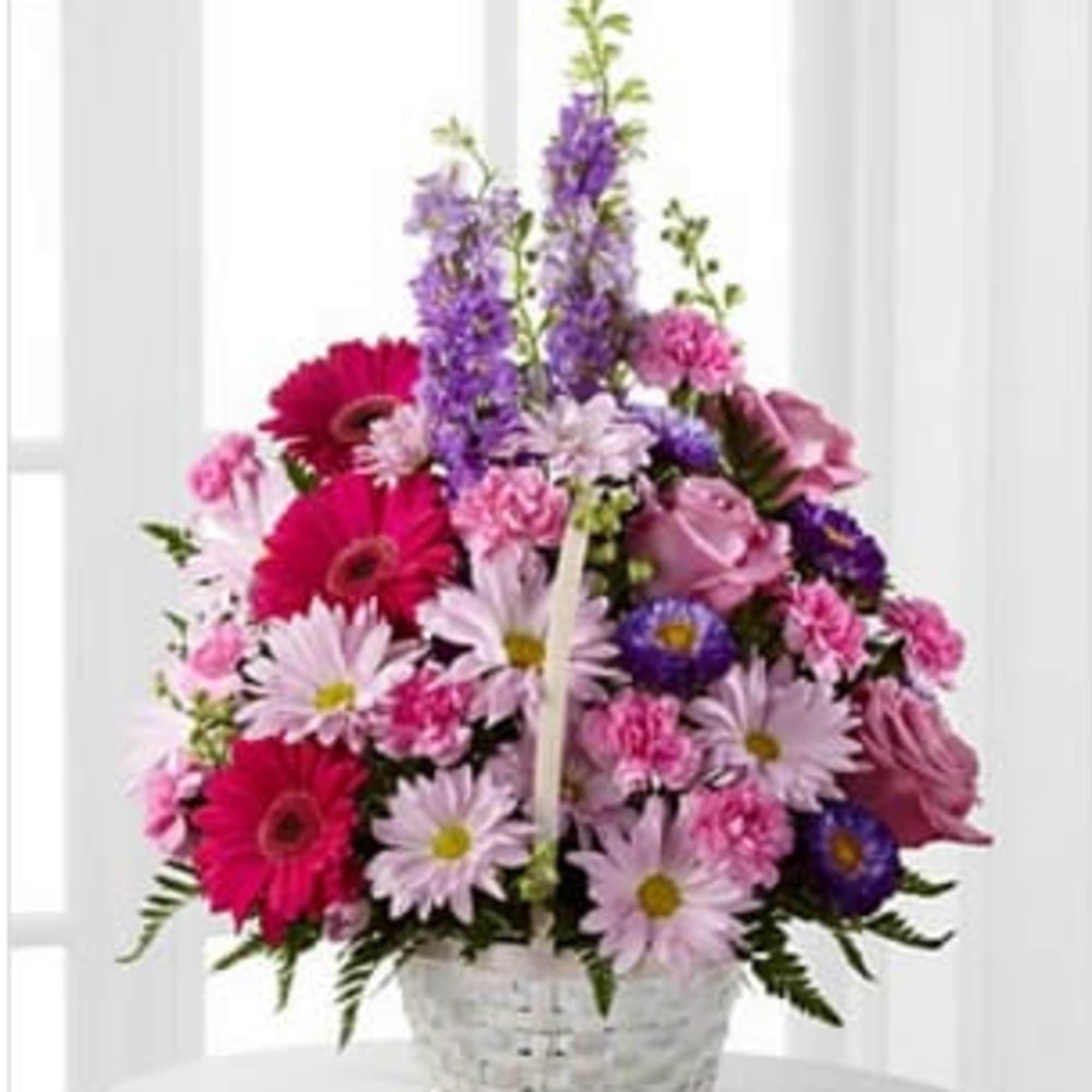 The FTD&reg; Pastel Peace&trade; Basket is a sweet and simple way to