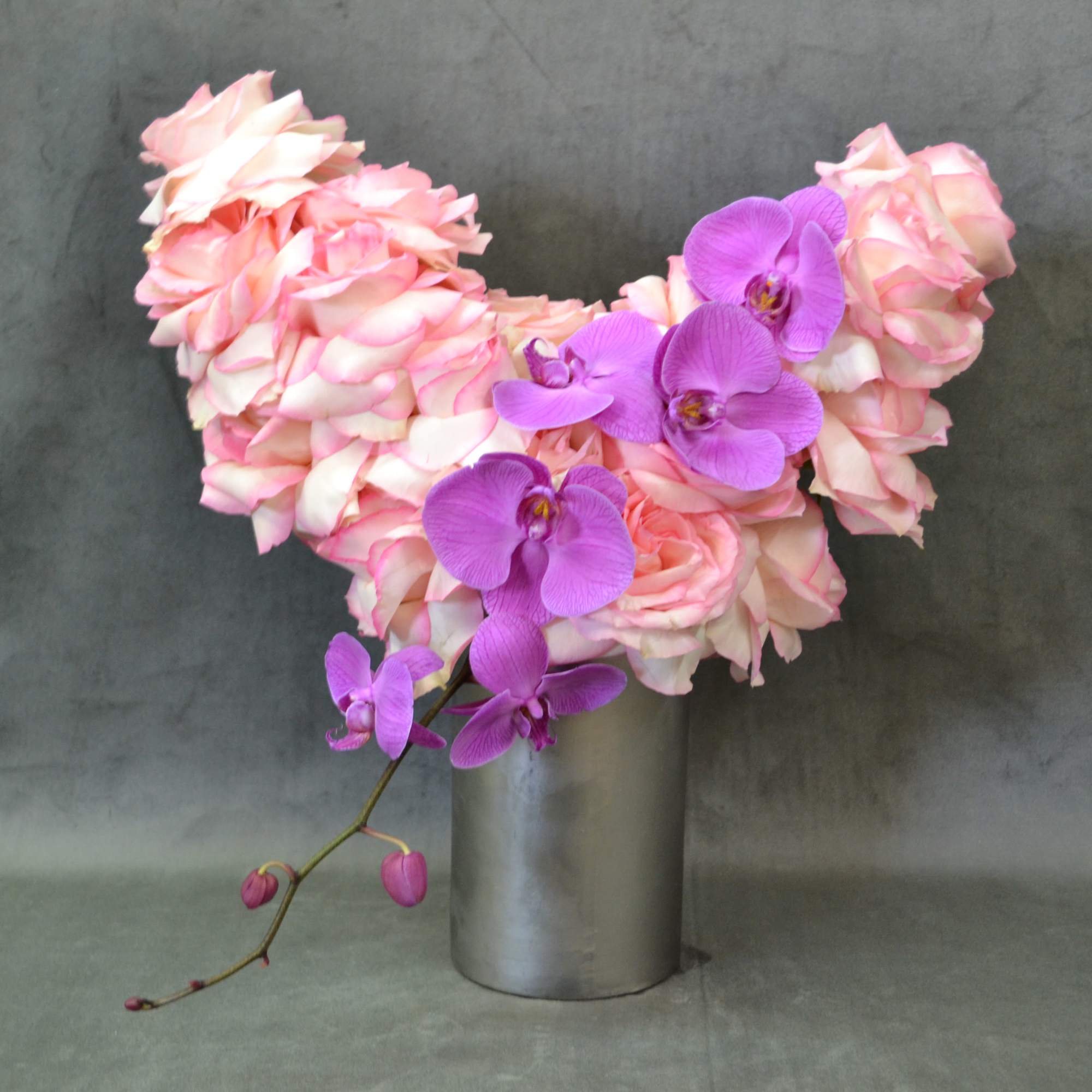 pink roses and phalaenopsis orchids