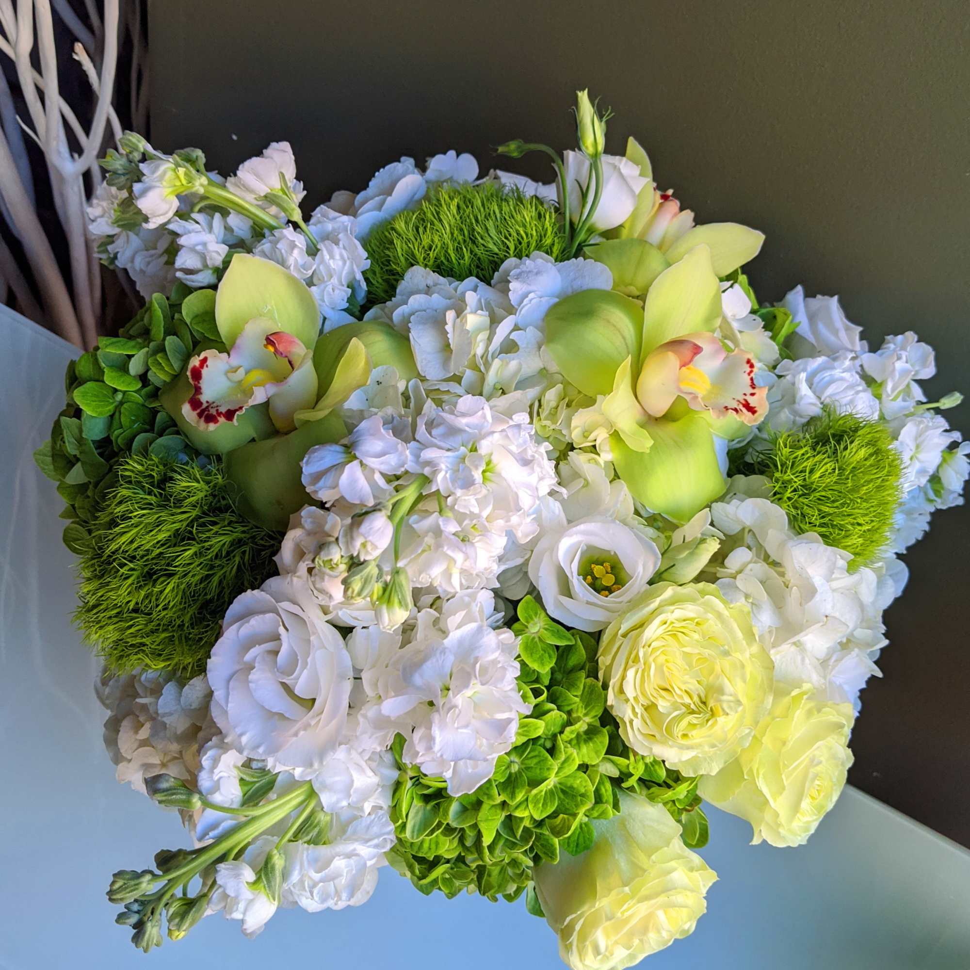 This simple classic arrangement can serve as a gift for any occasion.